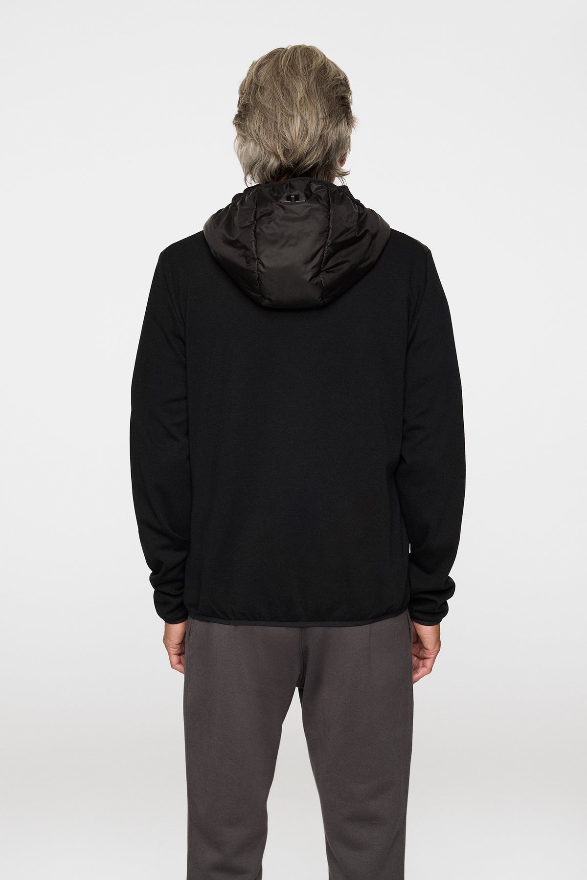 Gregory Hybrid Hood in Black by J.Lindeberg