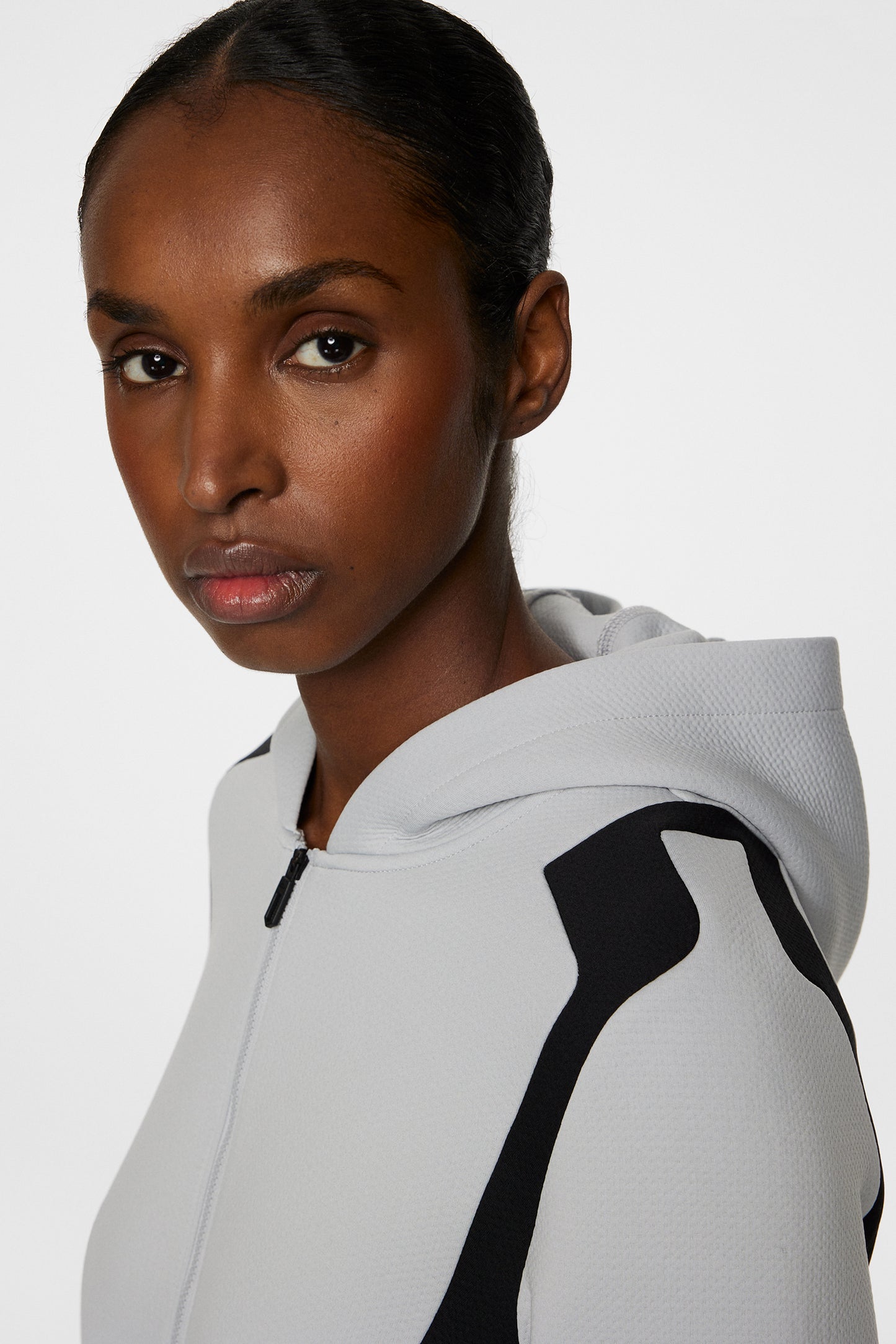 Ella Zip Hood in High Rise by J.Lindeberg