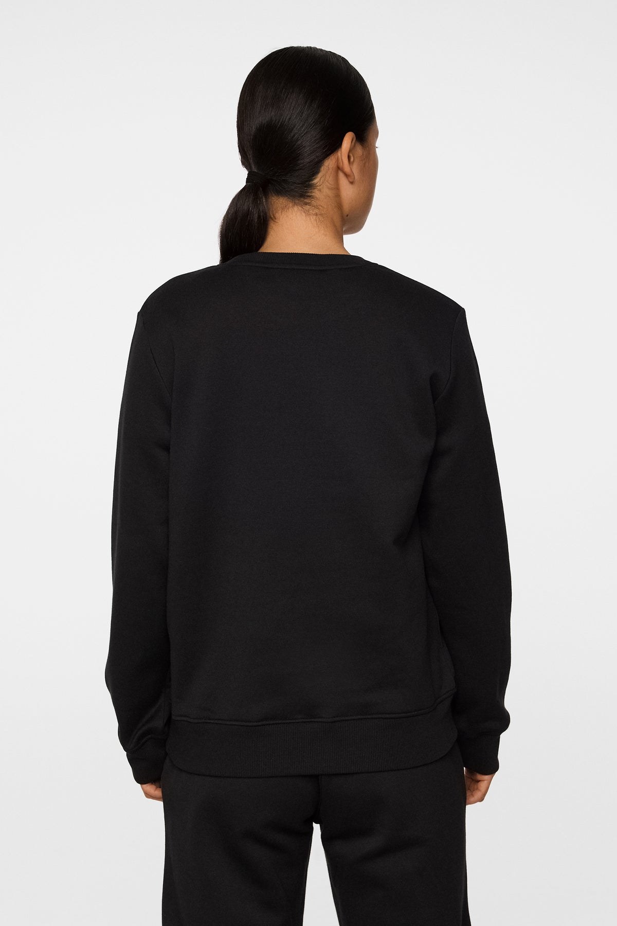 W Alpha Crew Neck in Black by J.Lindeberg