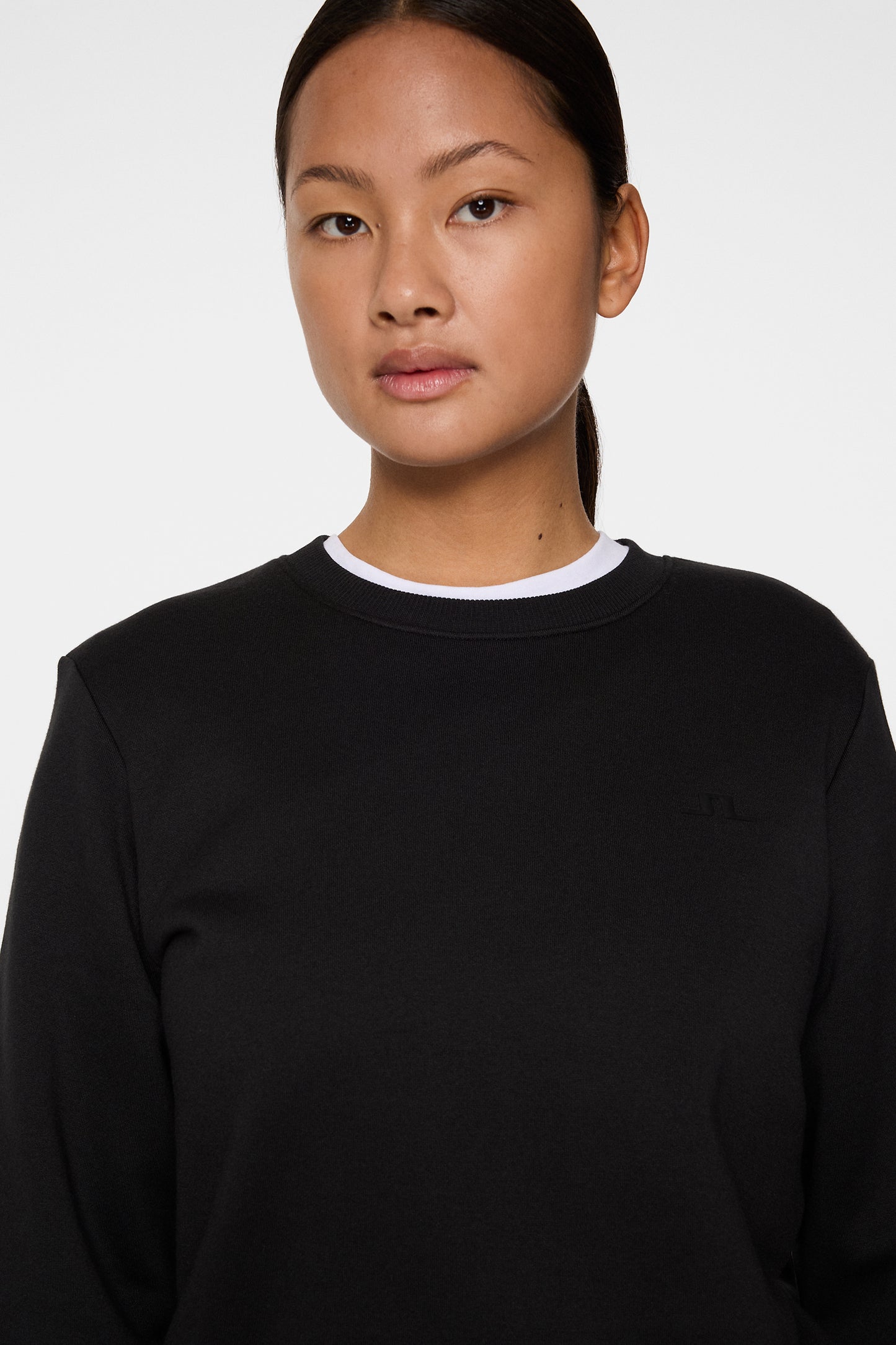 W Alpha Crew Neck in Black by J.Lindeberg