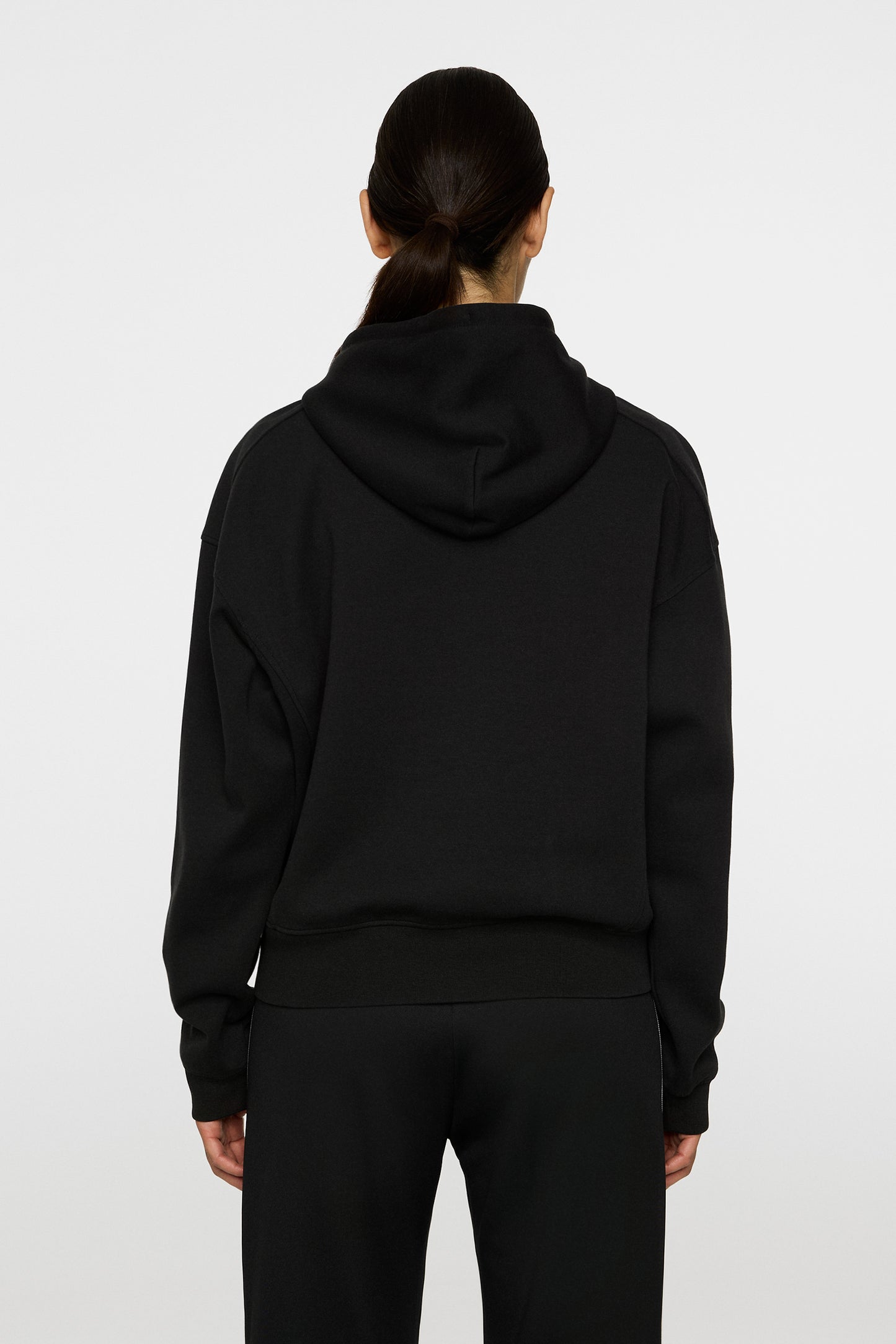 Dawn Hoodie in Black by J.Lindeberg