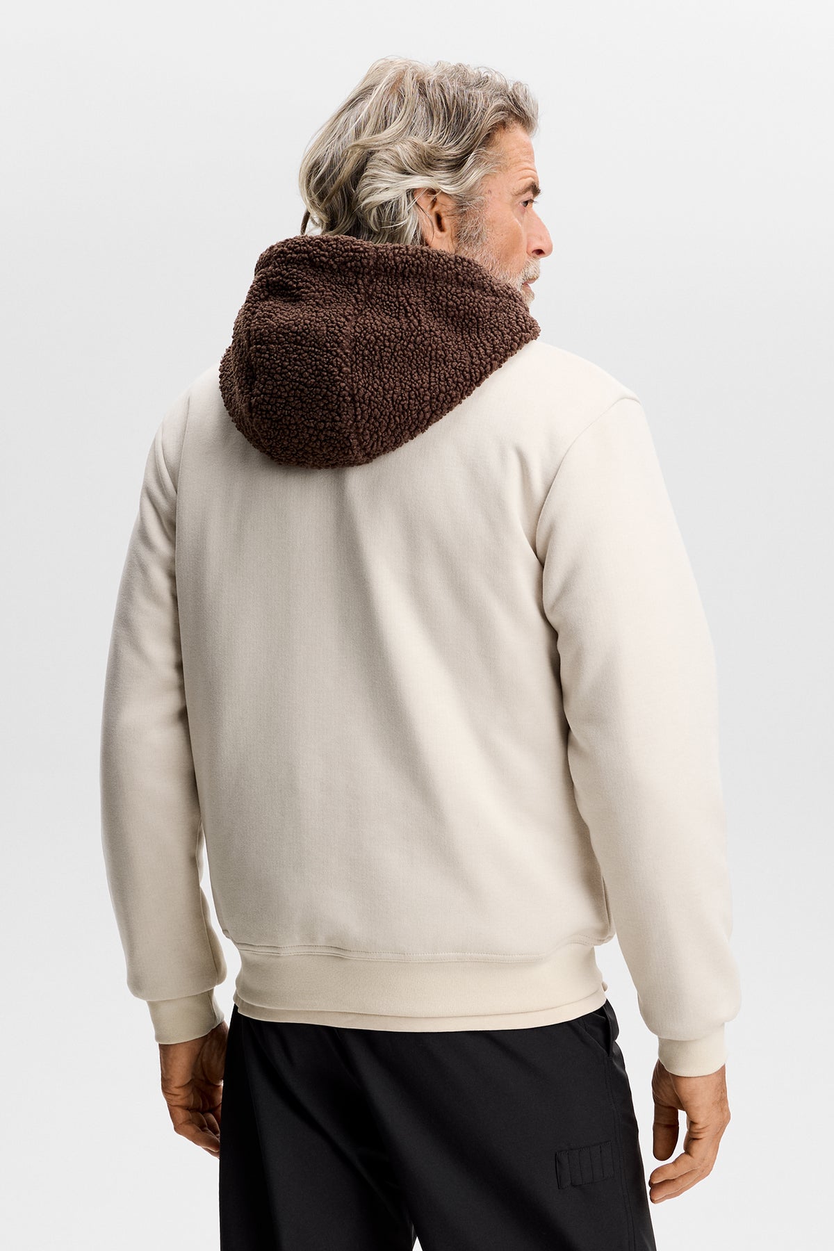 Back view: Henry Bonded Hoodie in Moonbeam, showing the brown textured hood and ribbed hem.