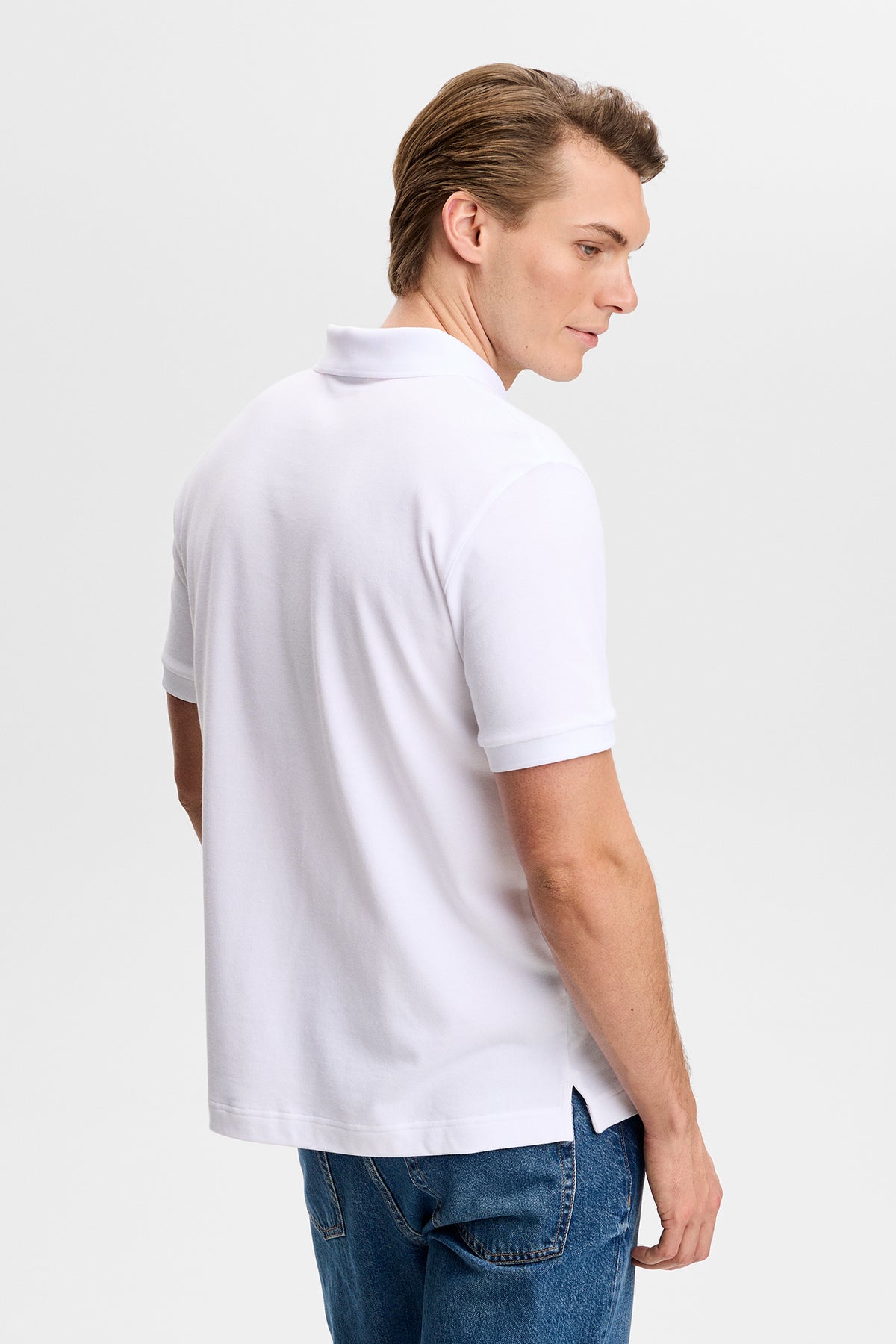 Verse Polo in White by J.Lindeberg