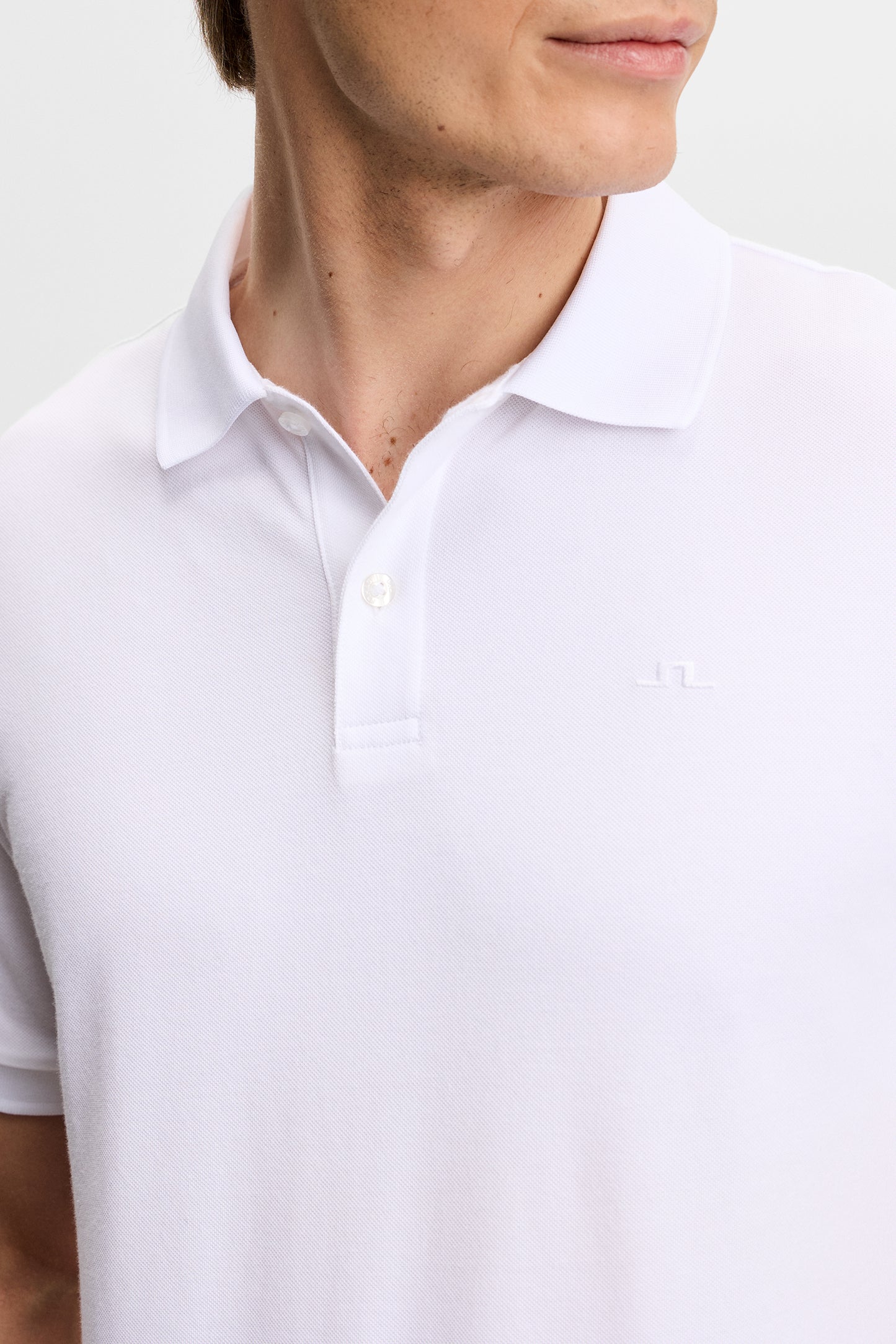Verse Polo in White by J.Lindeberg
