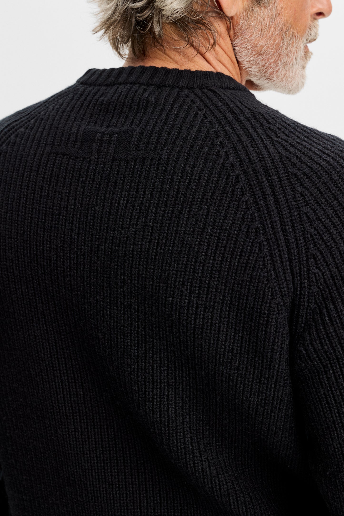 Hallow Knitted Crew Neck in Black by J.Lindeberg