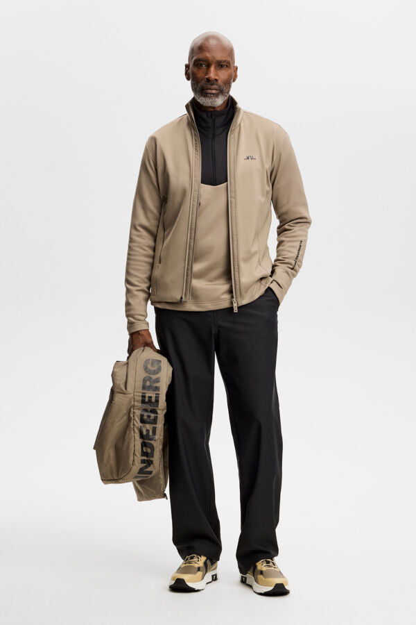 Full-body view: Model wearing the M Solarcore 3 in 1 Jacket in Brindle in a studio setting.