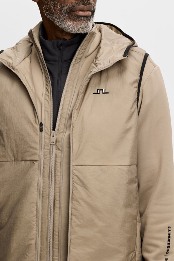 Close-up of the M Solarcore 3 in 1 Jacket in Brindle, showing the chest Bridge logo, zipper, and hood.