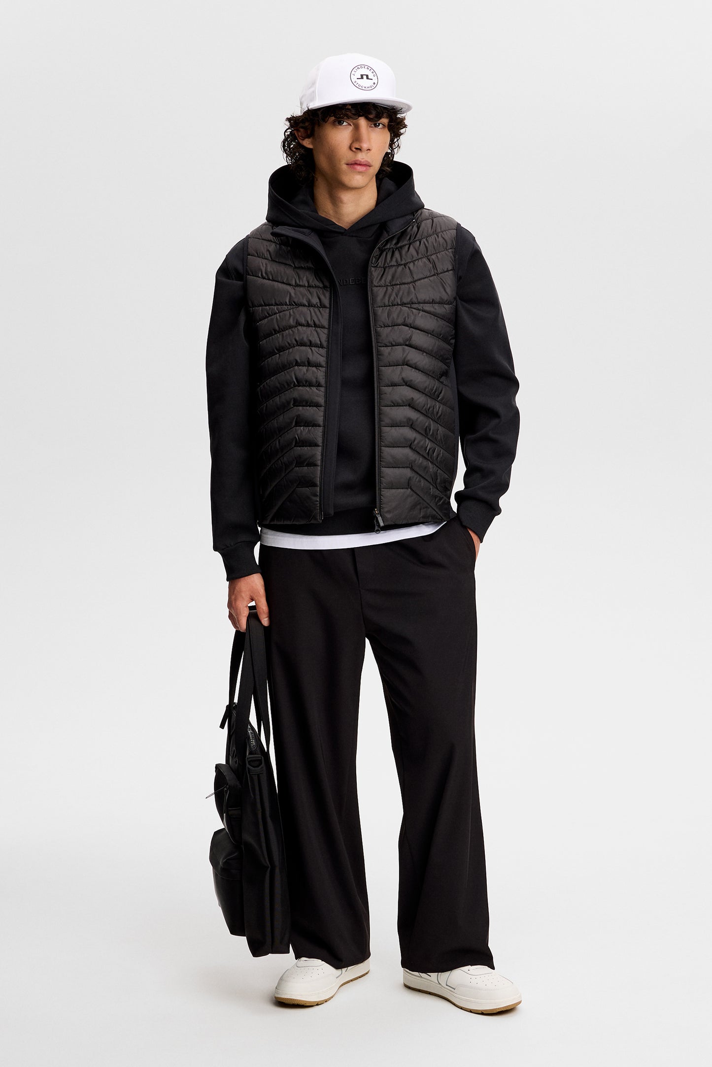 Heyden Quilt Hybrid Vest in Black by J.Lindeberg