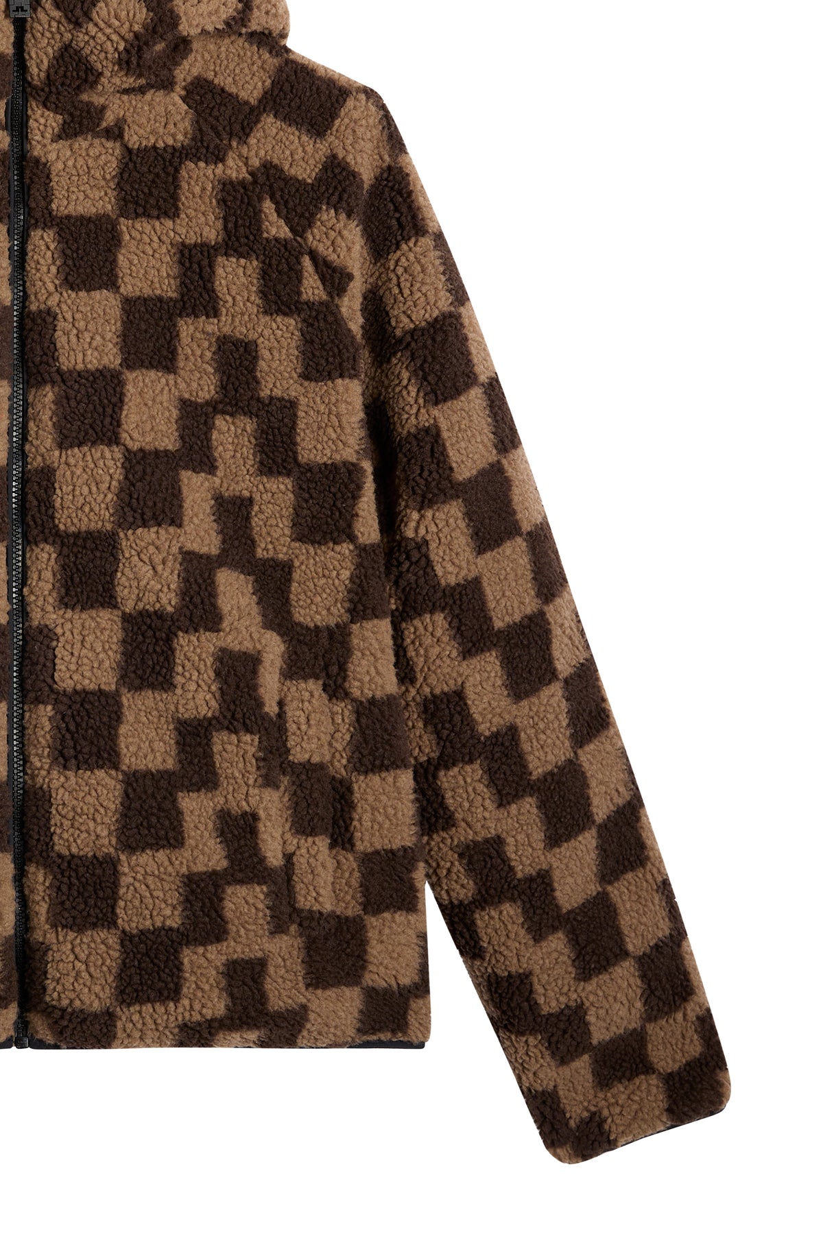 Close-up of the Rory Reversible Teddy Jacket showing the brown checkered fleece texture and front zipper.