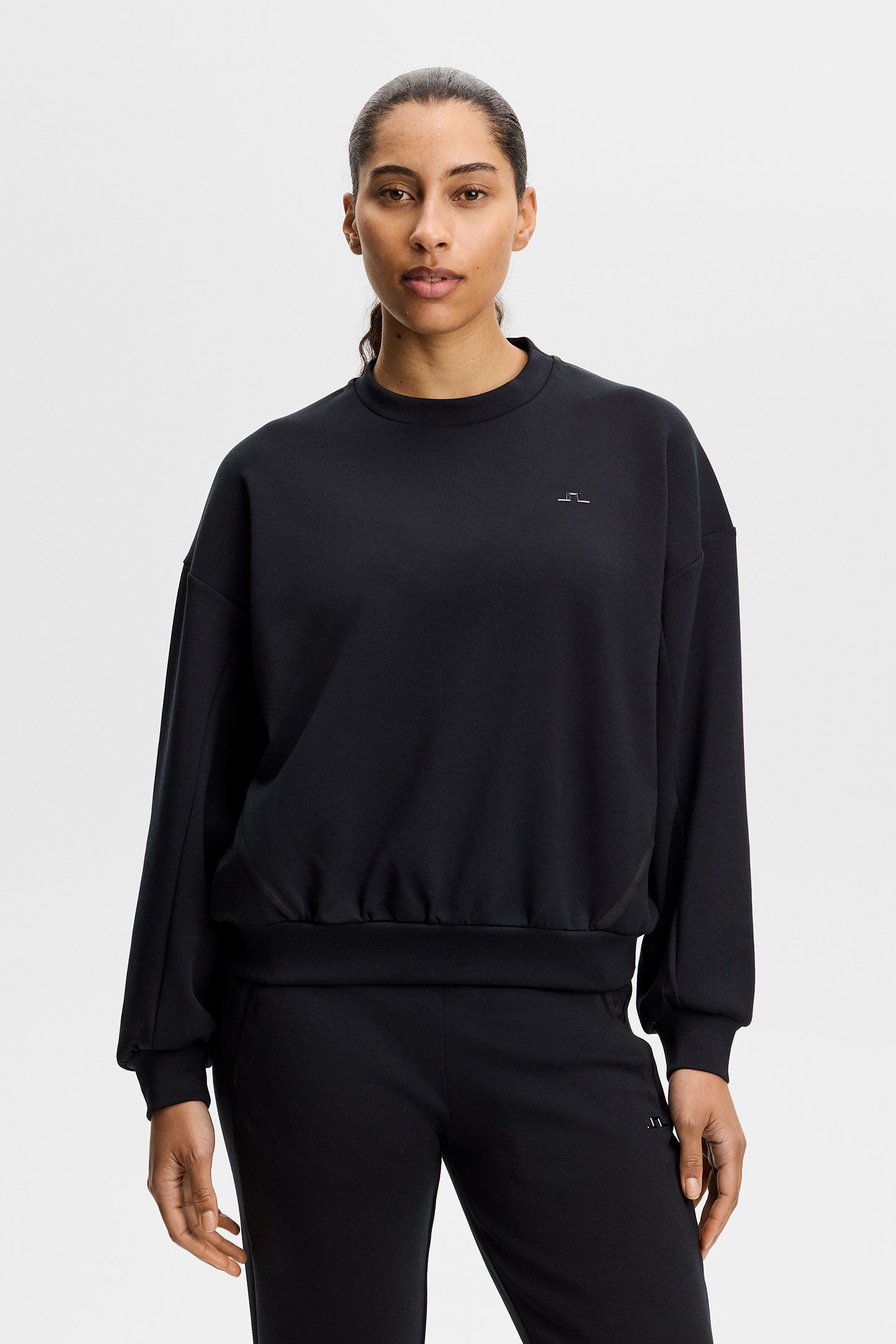 Aura Crew Neck in Black by J.Lindeberg