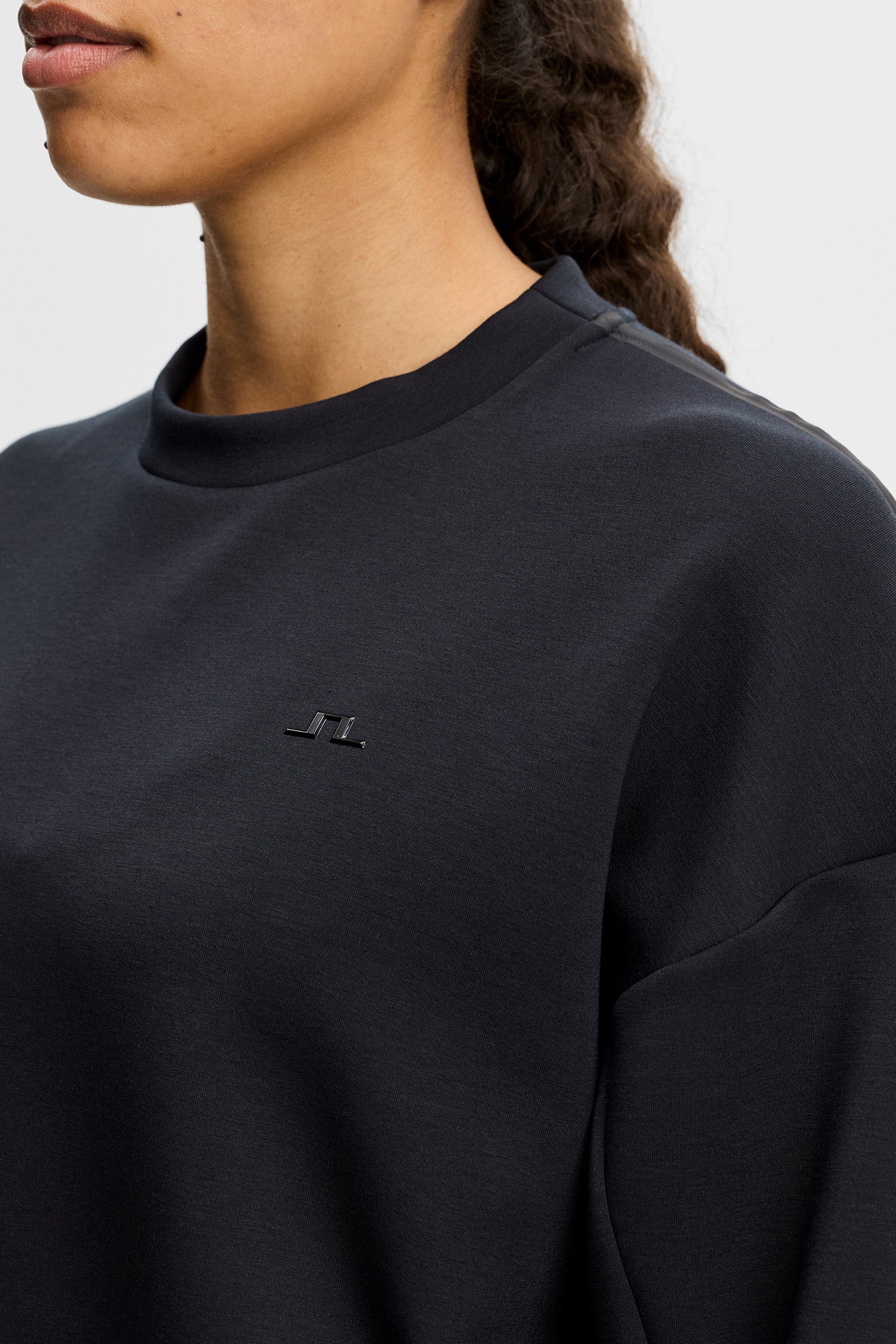 Aura Crew Neck in Black by J.Lindeberg