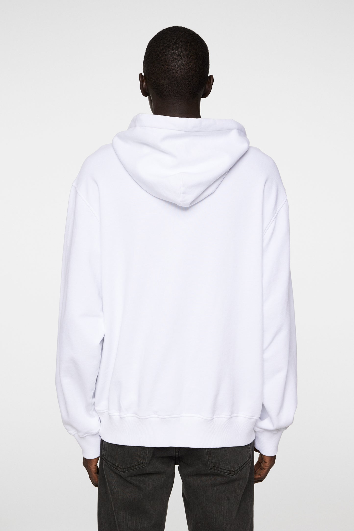 Callan Hoodie in White by J.Lindeberg
