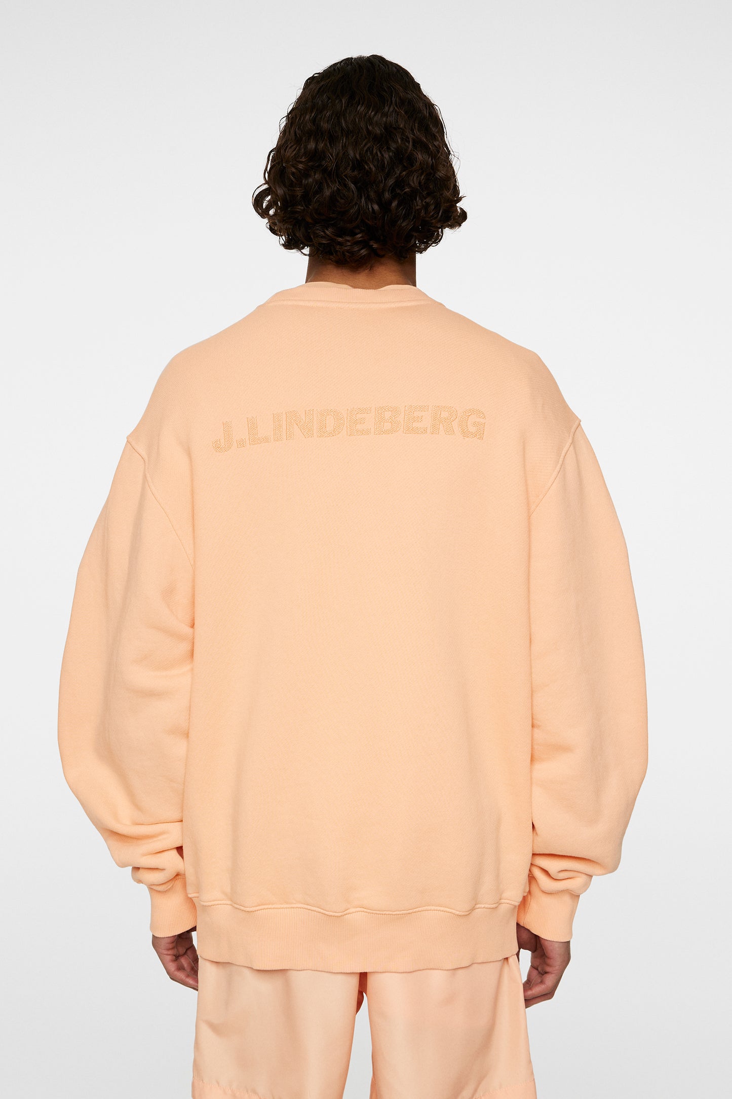 Callan Seasonal Logo Sweater in Mock Orange by J.Lindeberg