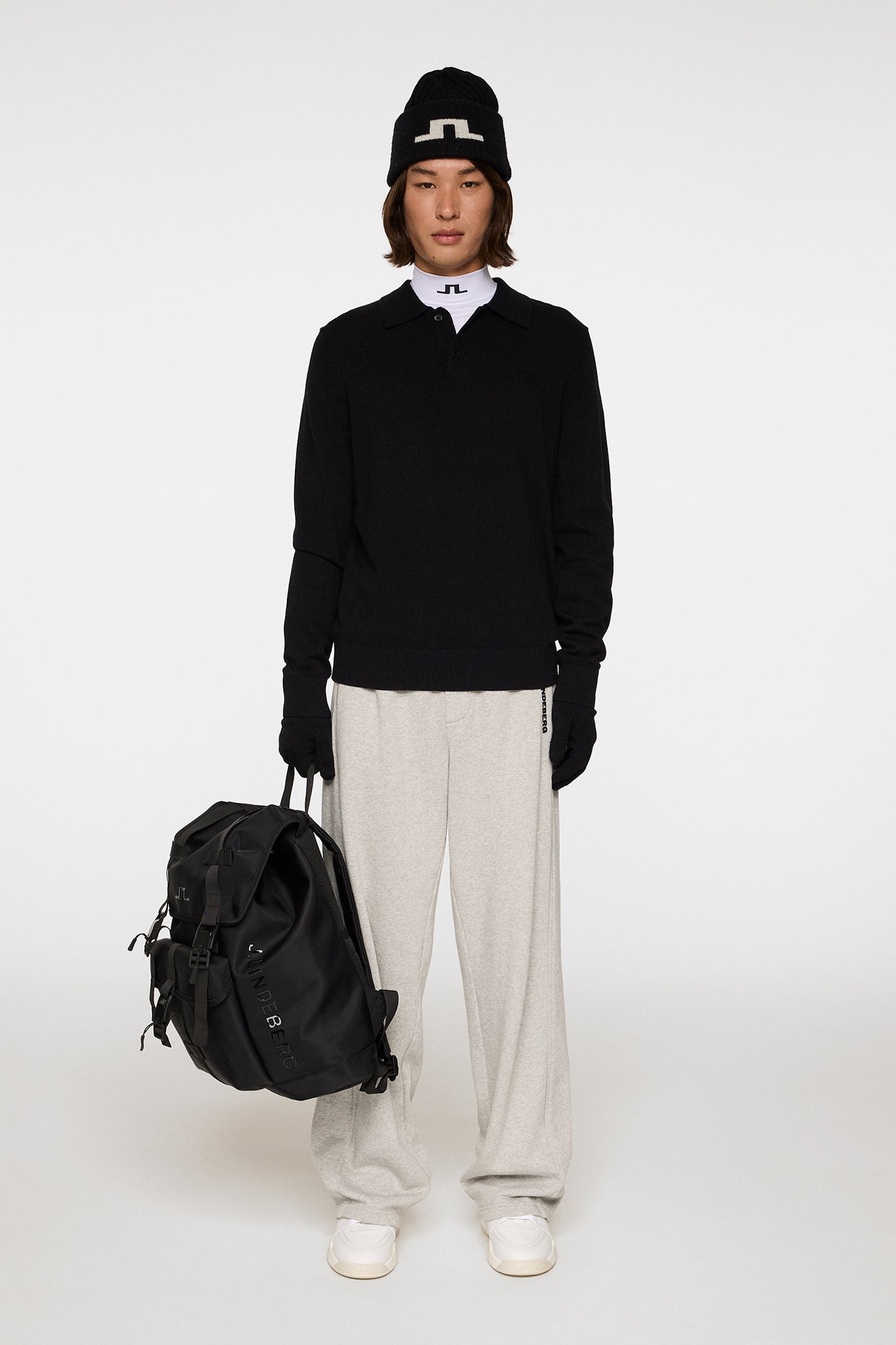 Edgar Knitted Wool Polo in Black by J.Lindeberg