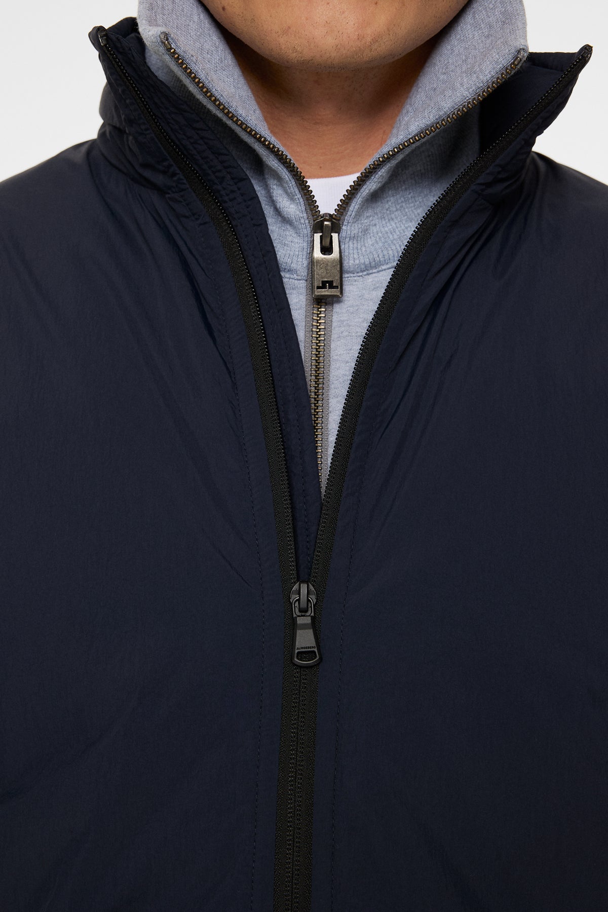 Parrie ligh padd pack jkt in JL Navy by J.Lindeberg