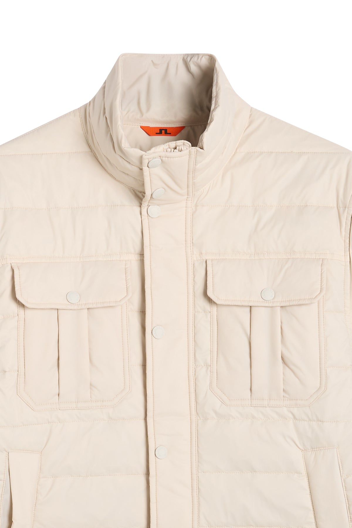 Close-up view: Bailey Light Padded Jacket in Moonbeam, showing the stand collar, snap placket, and flap chest pockets.