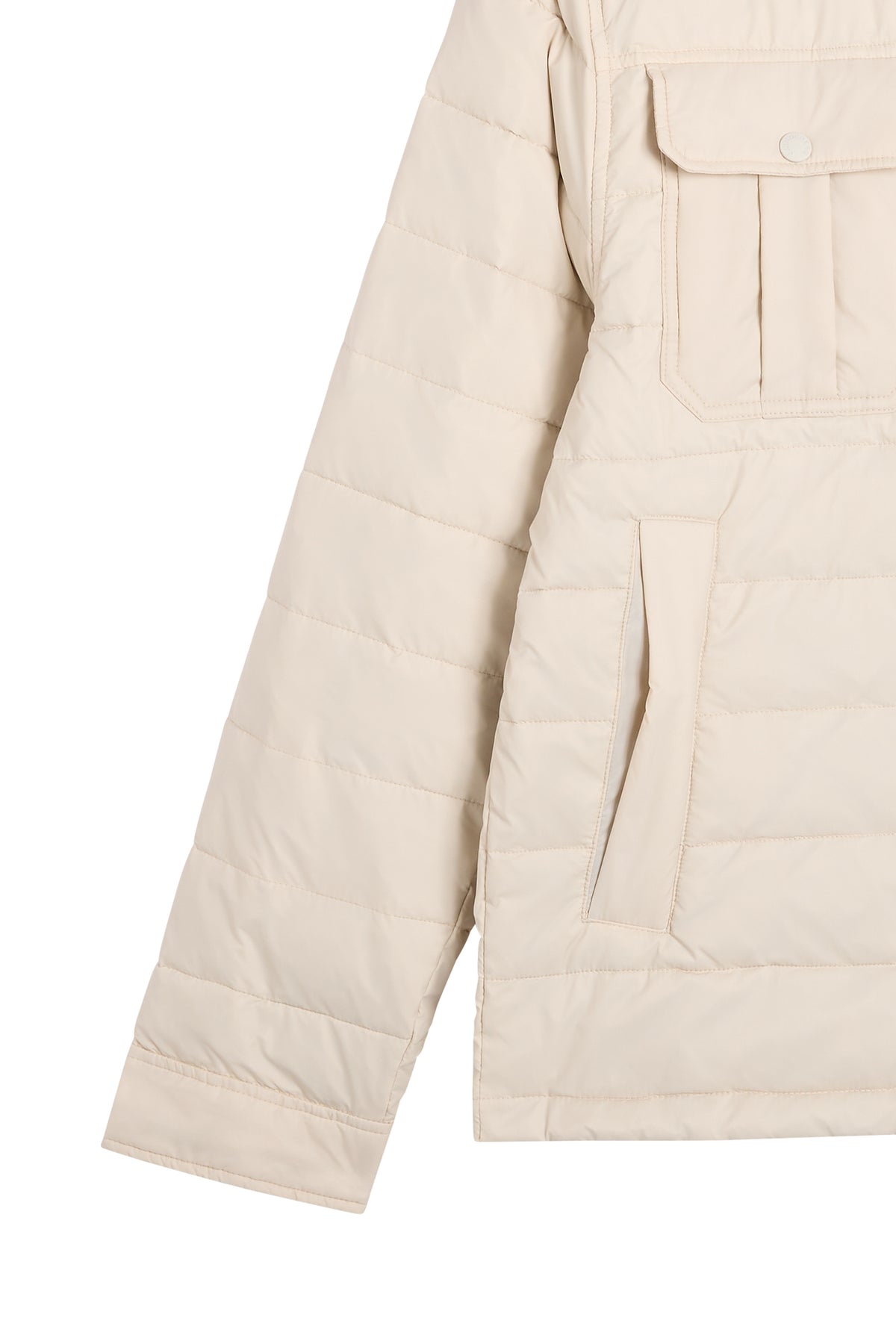 Close-up of quilted panels, chest flap pocket, and side pocket on the Bailey Light Padded Jacket in Moonbeam.