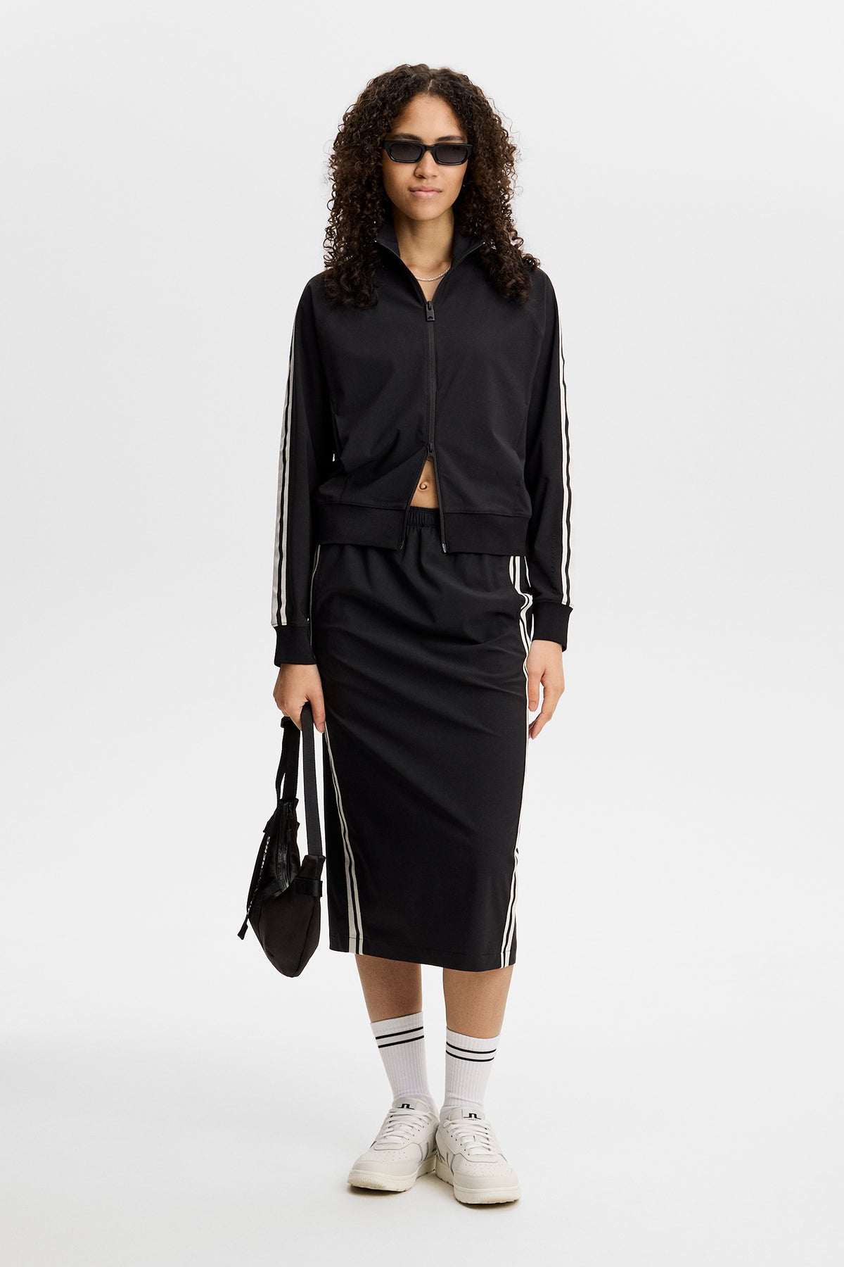 Paula Skirt in Black by J.Lindeberg