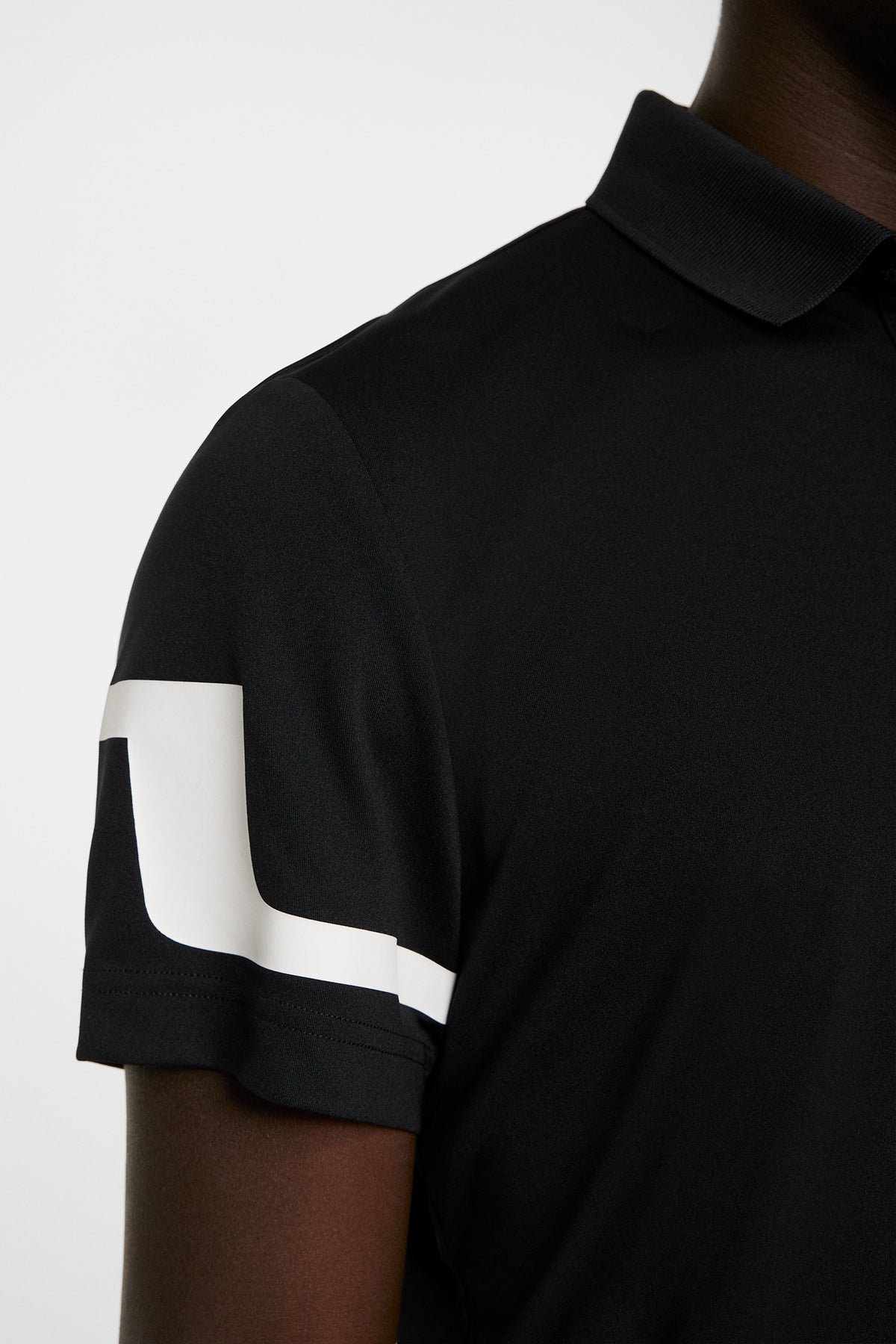 Heath Regular Fit Golf Polo in Black by J.Lindeberg