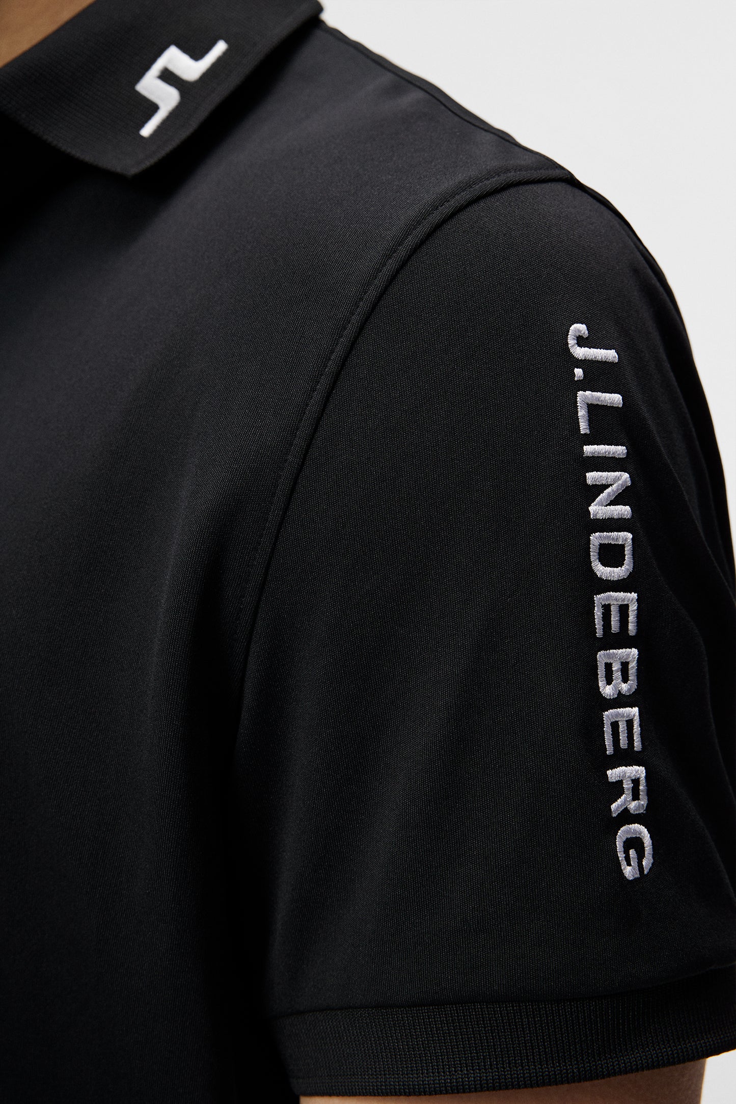 Tour Tech Reg Fit Golf Polo in Black by J.Lindeberg