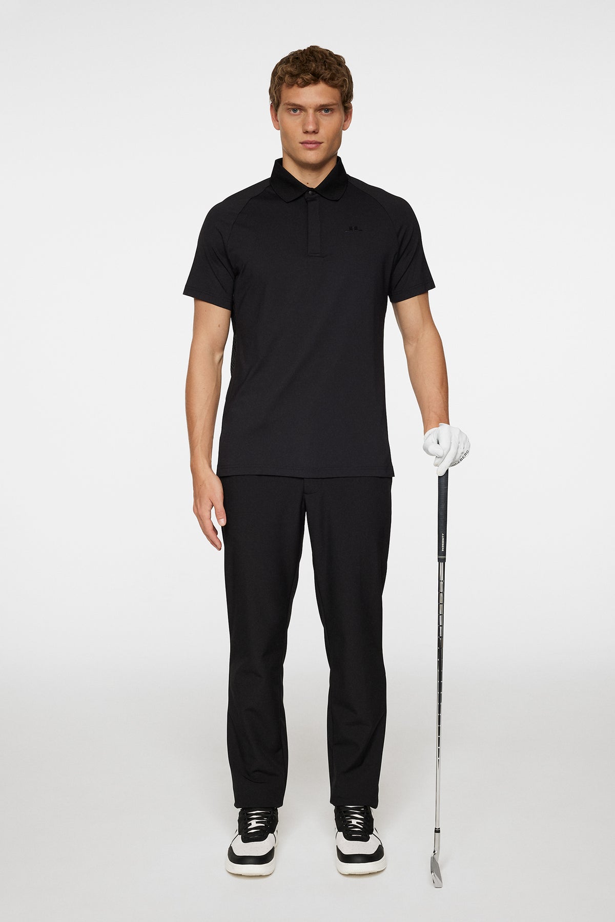 Ray Hybrid Polo in Black by J.Lindeberg
