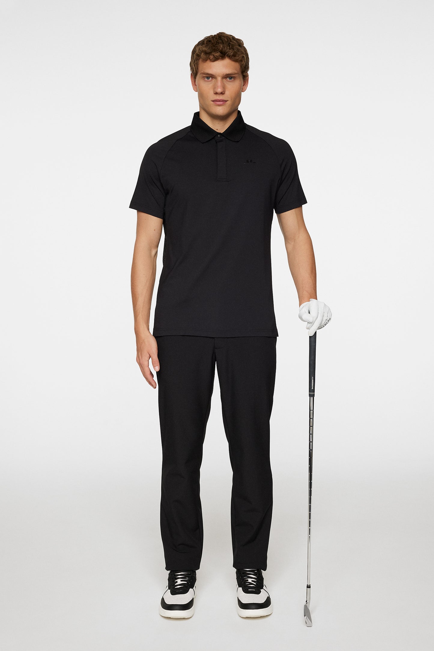 Ray Hybrid Polo in Black by J.Lindeberg