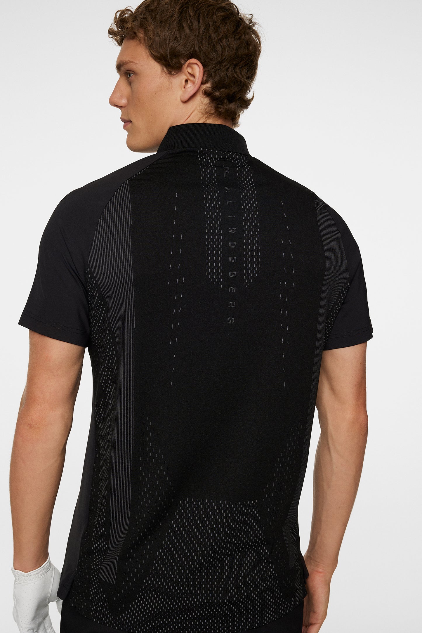 Ray Hybrid Polo in Black by J.Lindeberg