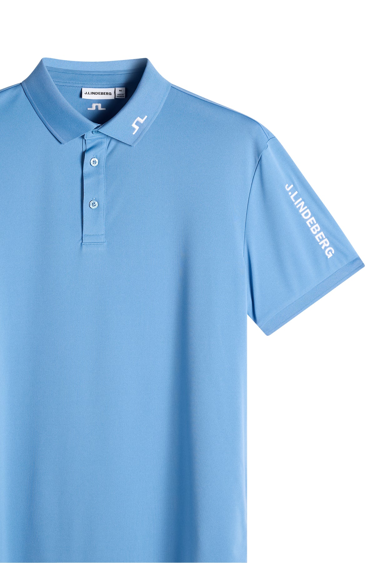 Close-up: Blue Tour Tech Polo with embroidered Bridge logo on the collar and J.LINDEBERG text on the sleeve.