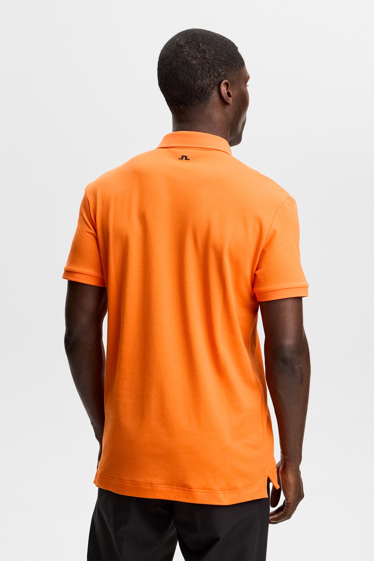 Tour Tech Pique Polo in Golden Poppy by J.Lindeberg