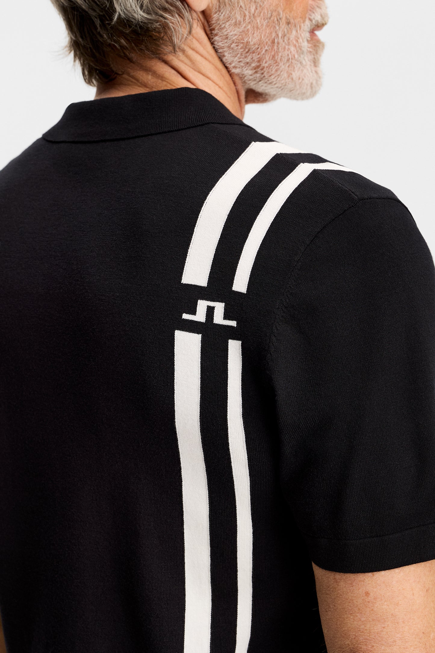 30Y Wallis Knit Polo in Black by J.Lindeberg