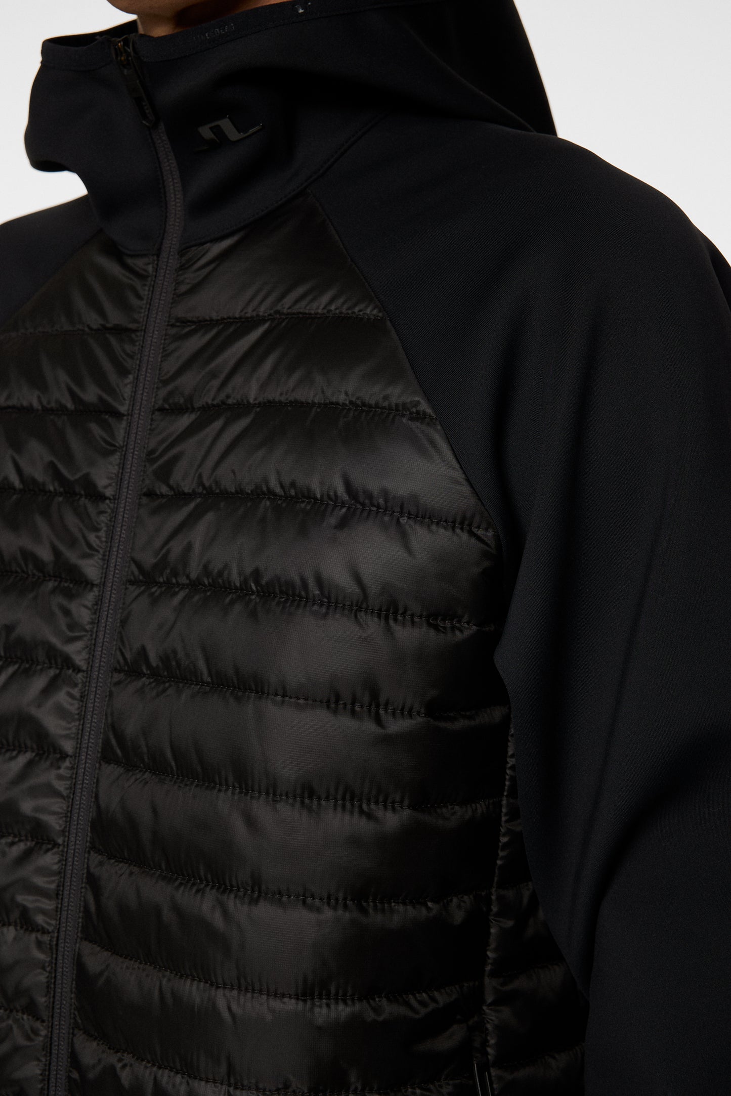 Hayden Quilt Hybrid Hood in Black by J.Lindeberg