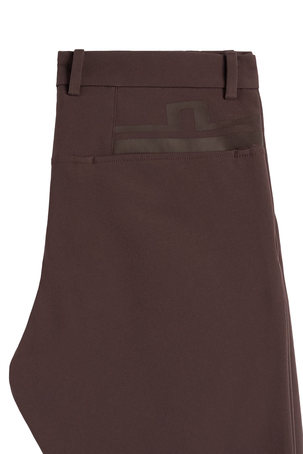 Close-up: Mitch Bonded Players Pant in Seal Brown showing the back waistband, belt loops, and tonal Bridge logo.