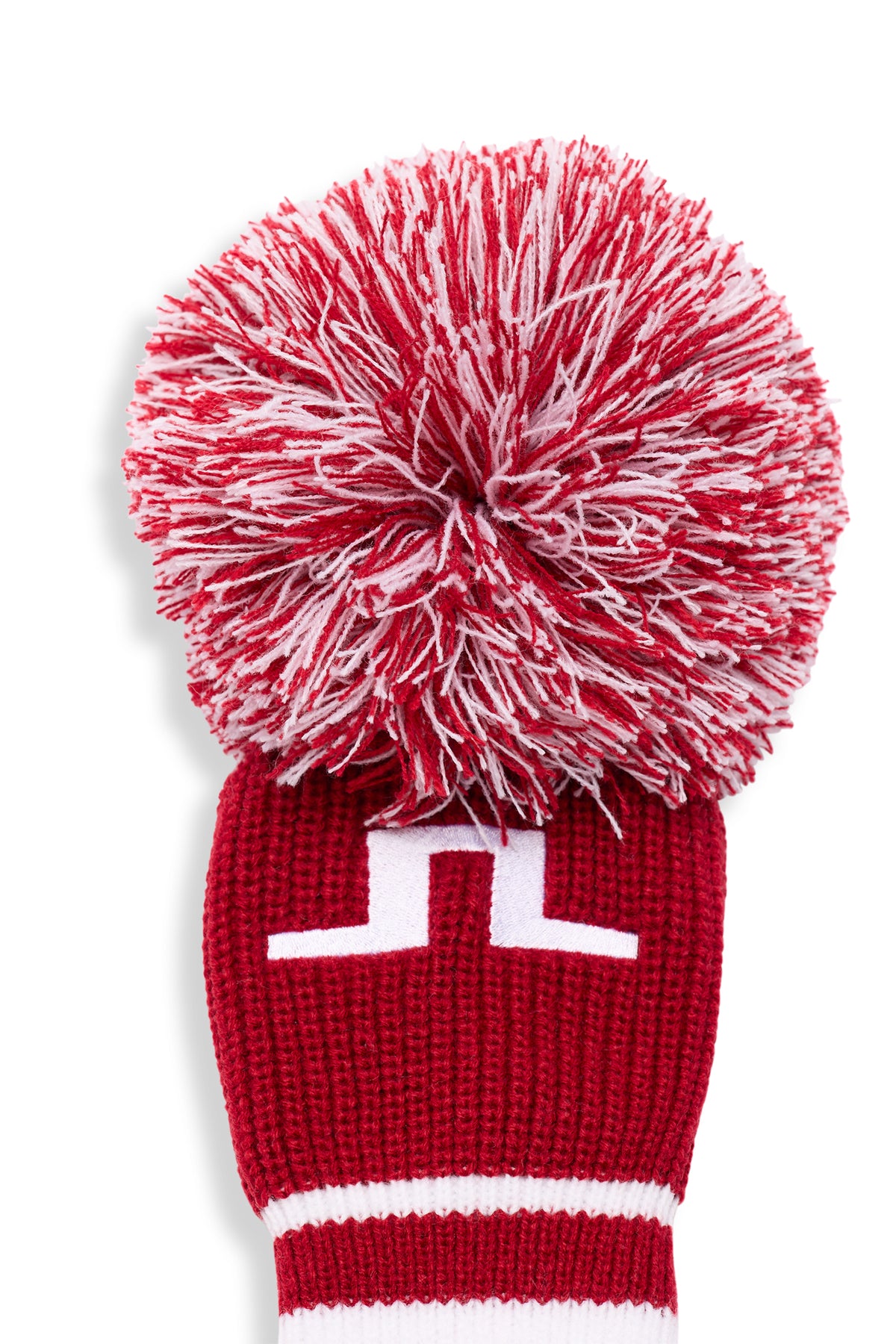 Close-up of the JL Knitted Driver Cover in red, featuring a pom-pom and embroidered Bridge logo.
