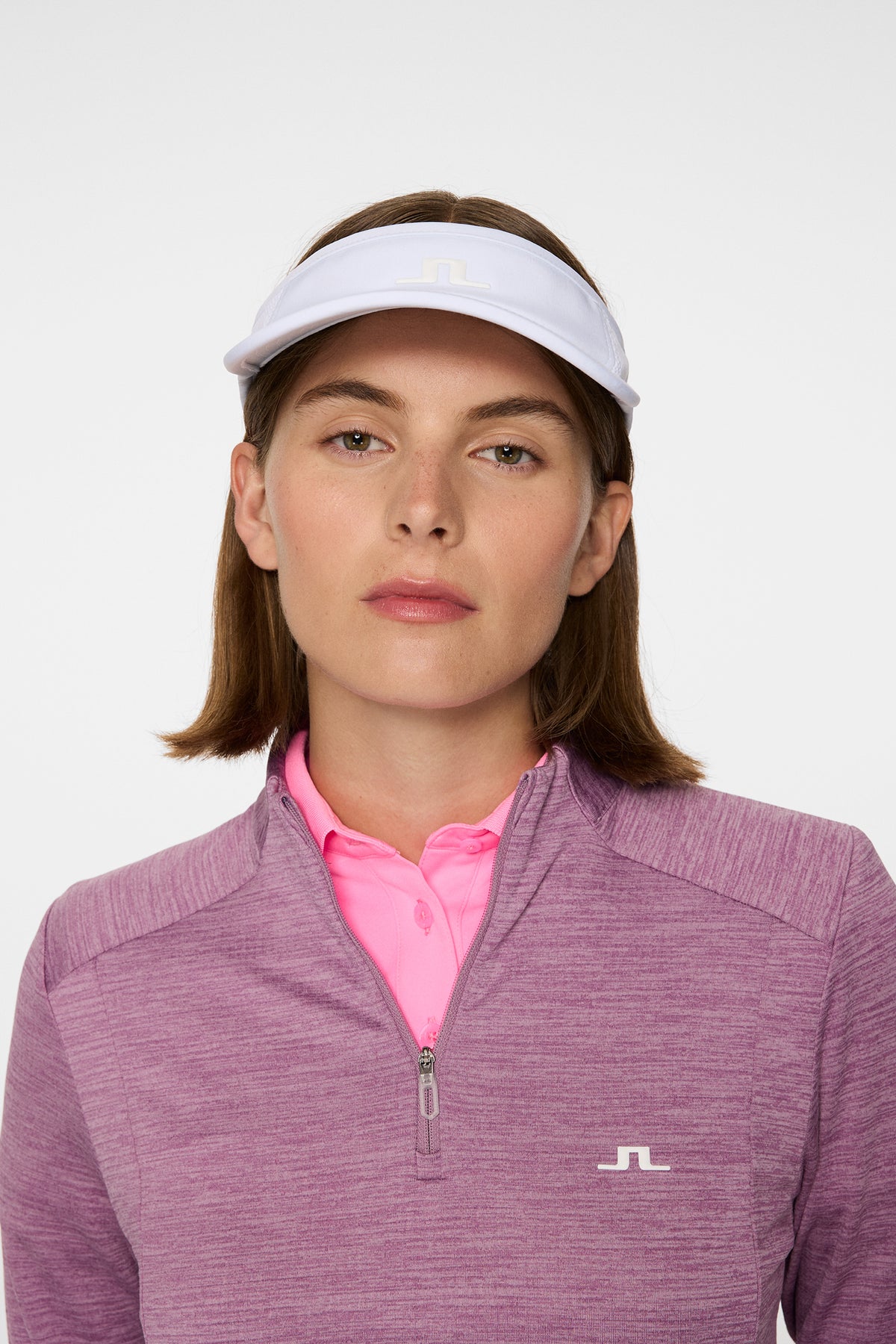Attain Visor in White by J.Lindeberg