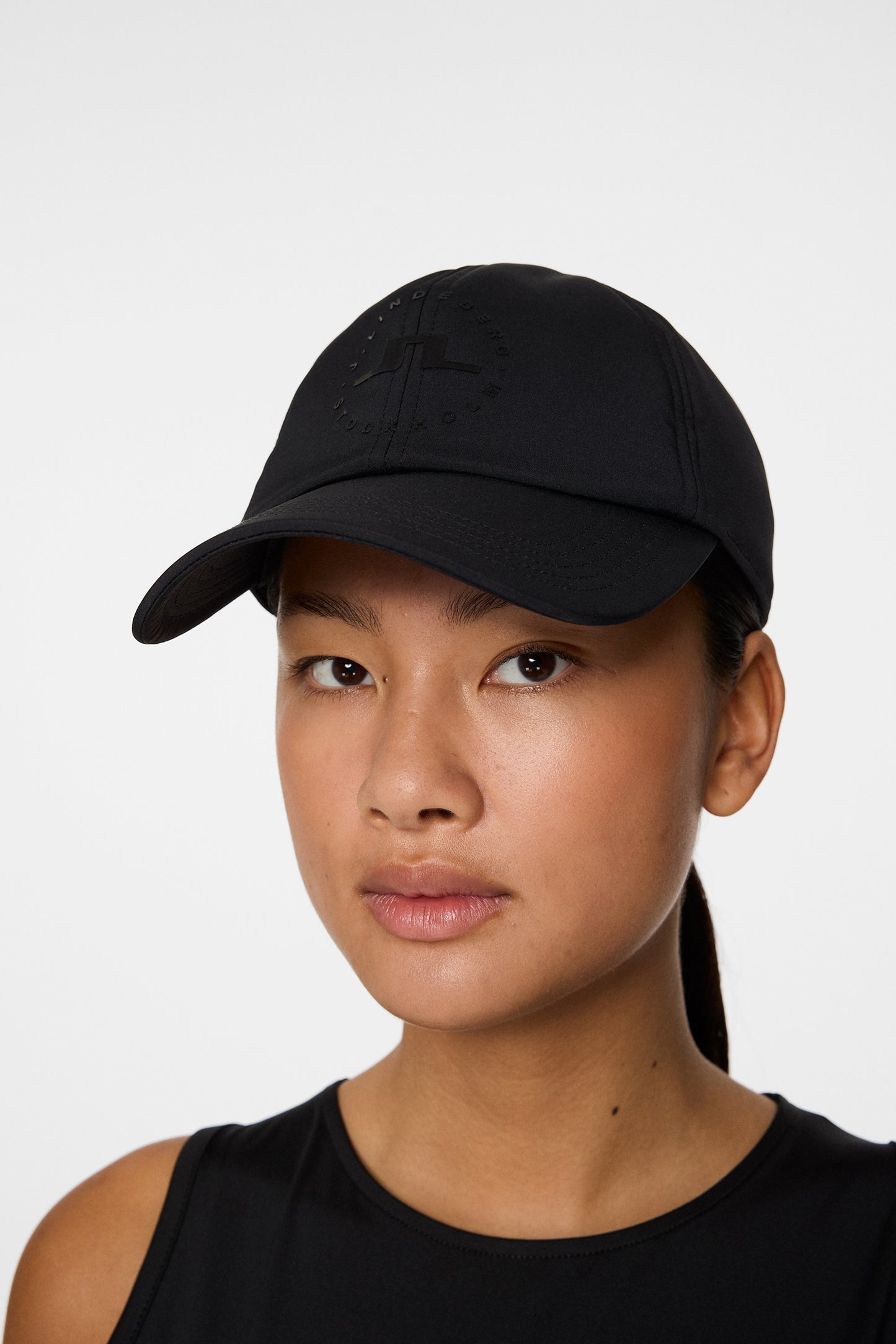 Shift cap in Black by J.Lindeberg