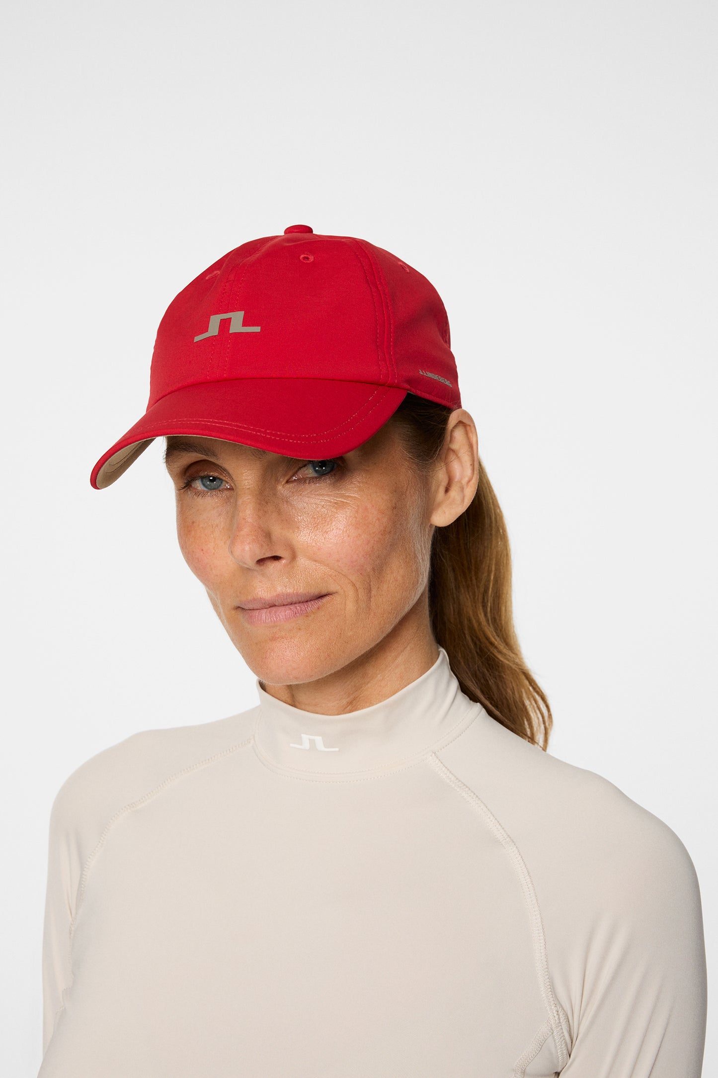 Thea Cap in Barbados Cherry by J.Lindeberg