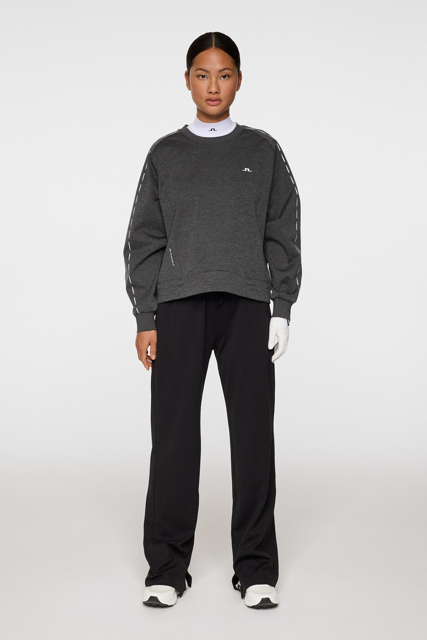 Lucy Windblock Sweatshirt in Asphalt and Black Melange by J.Lindeberg