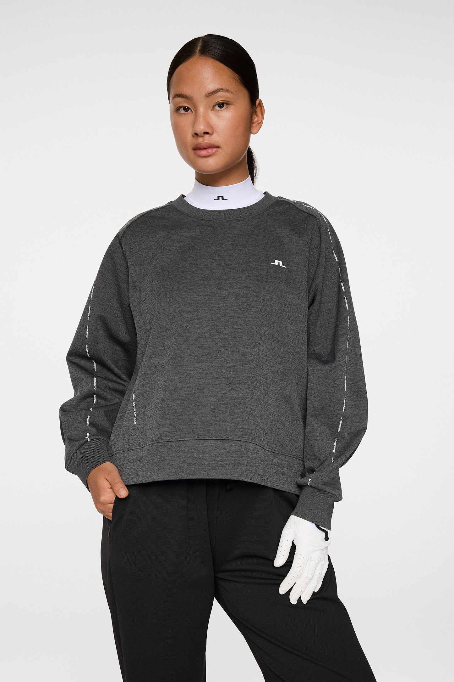 Lucy Windblock Sweatshirt in Asphalt and Black Melange by J.Lindeberg