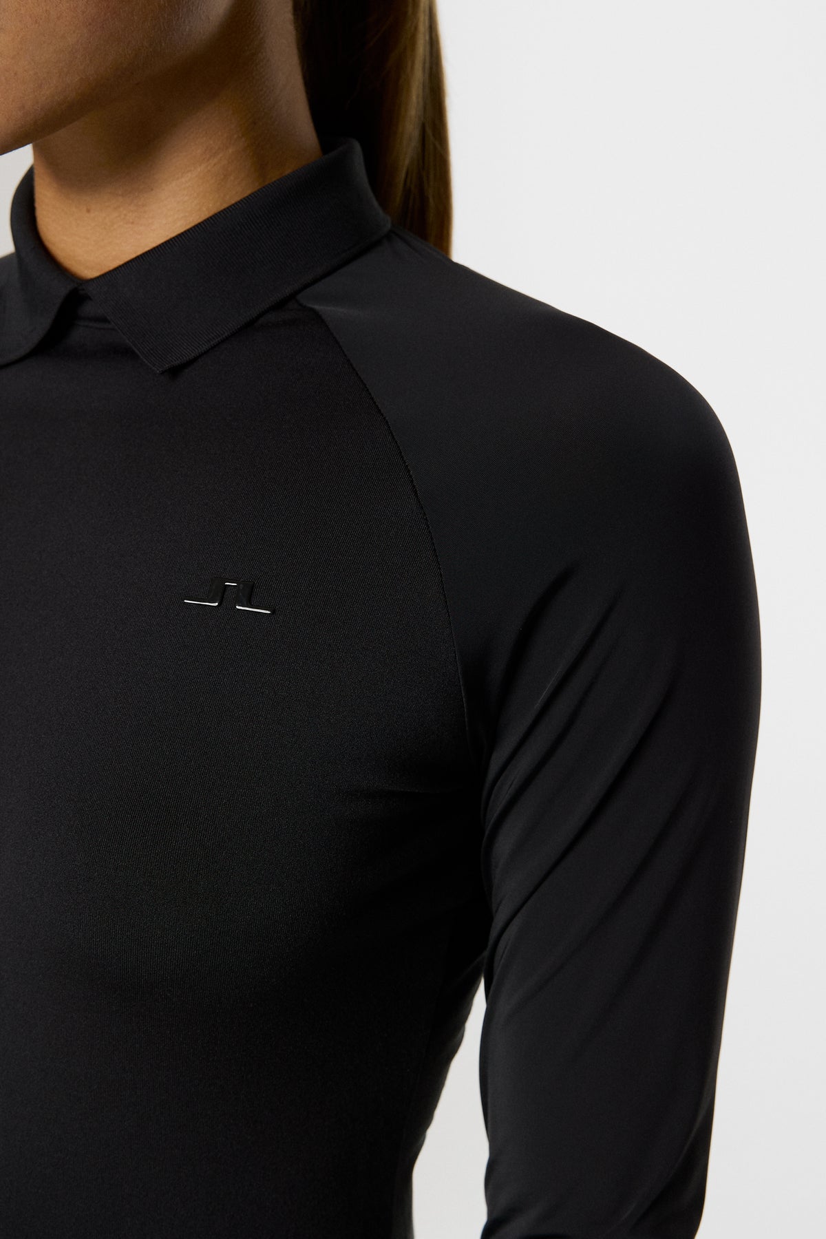 Tori Hybrid LS Polo in Black by J.Lindeberg