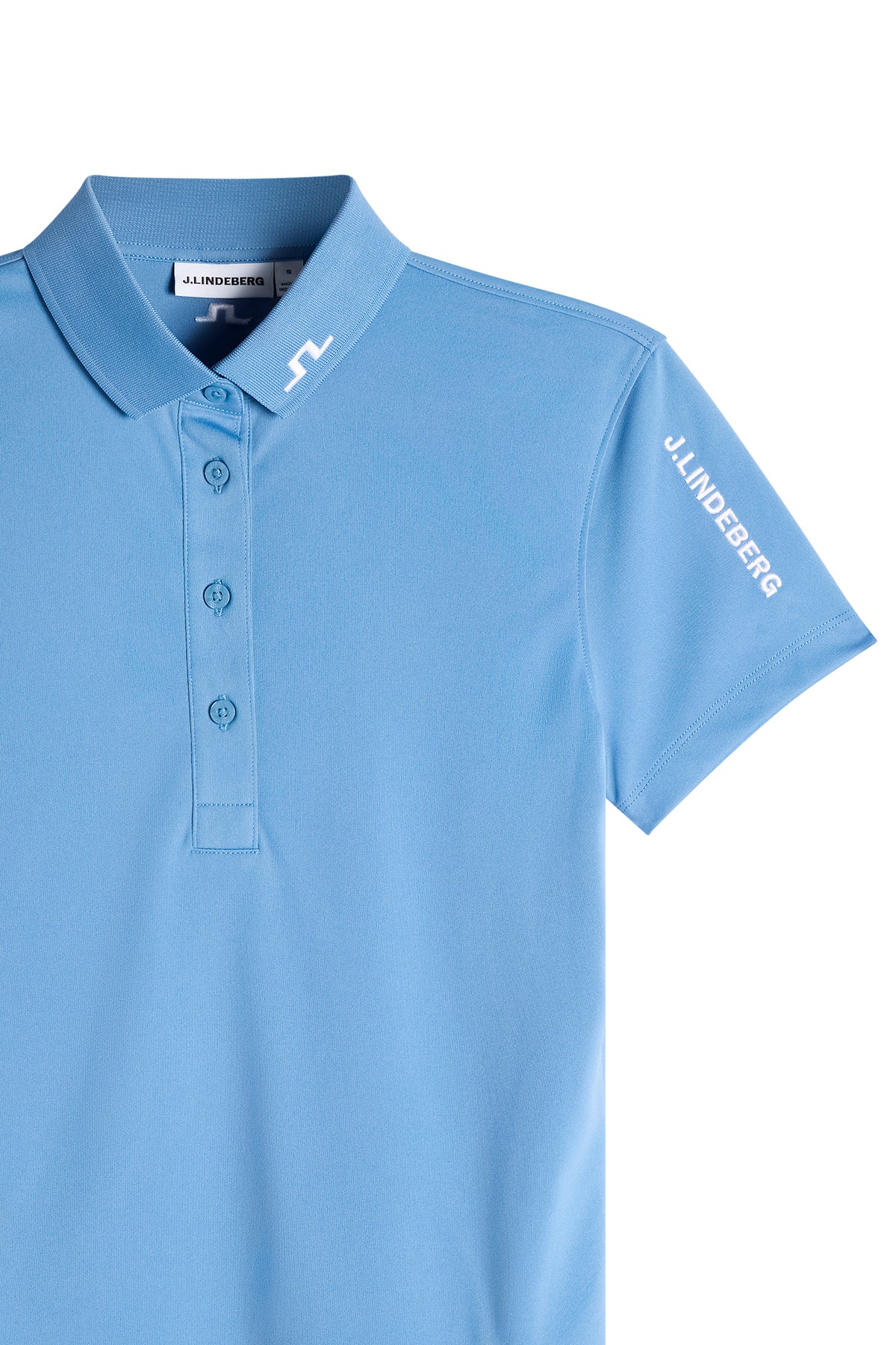 Close-up of the Tour Tech Polo in Riviera blue, showing the collar Bridge logo, four-button placket, and sleeve logo.