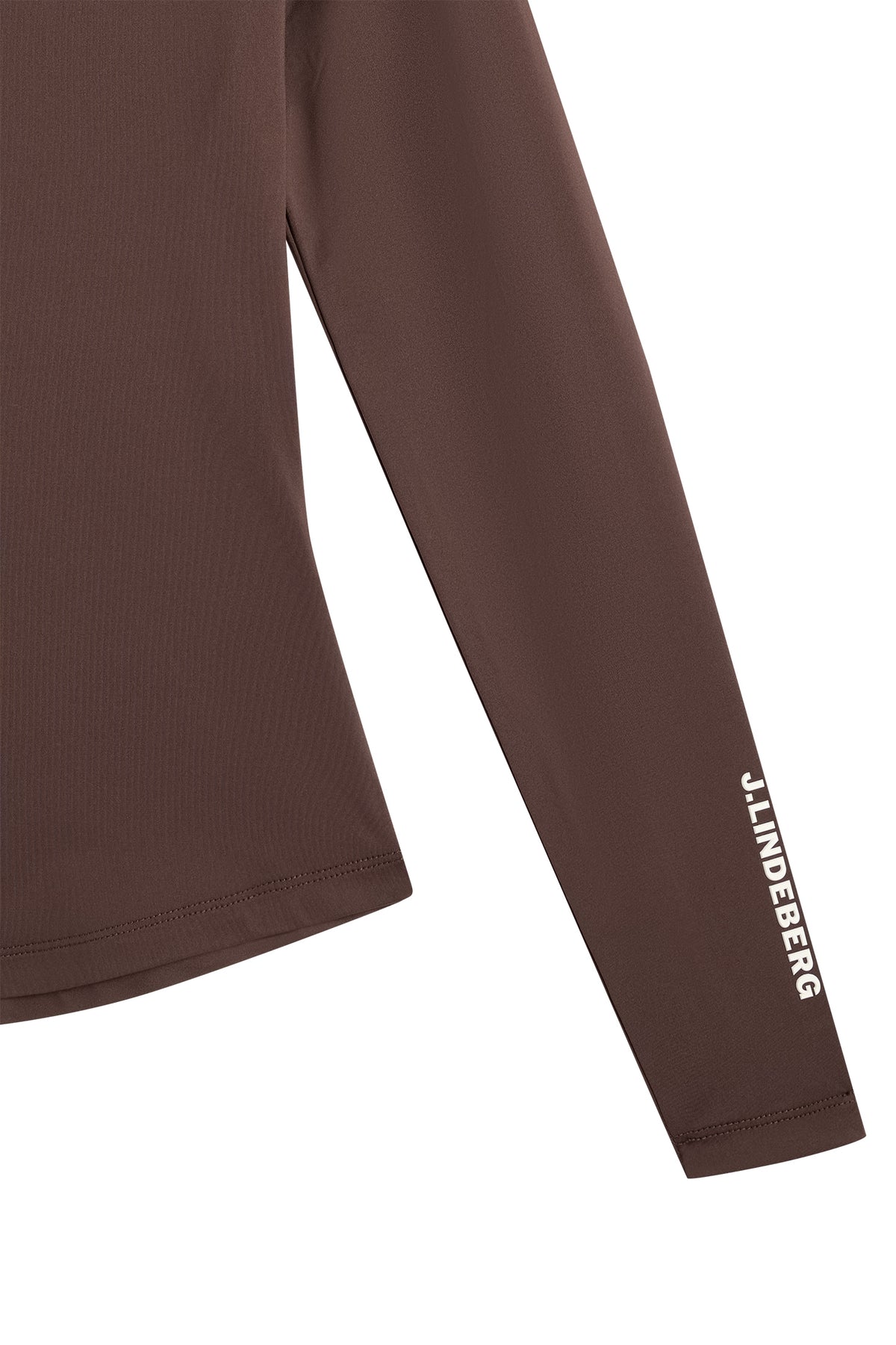 Close-up view: Louisa Compression Top in Seal Brown with J.LINDEBERG logo on the sleeve.