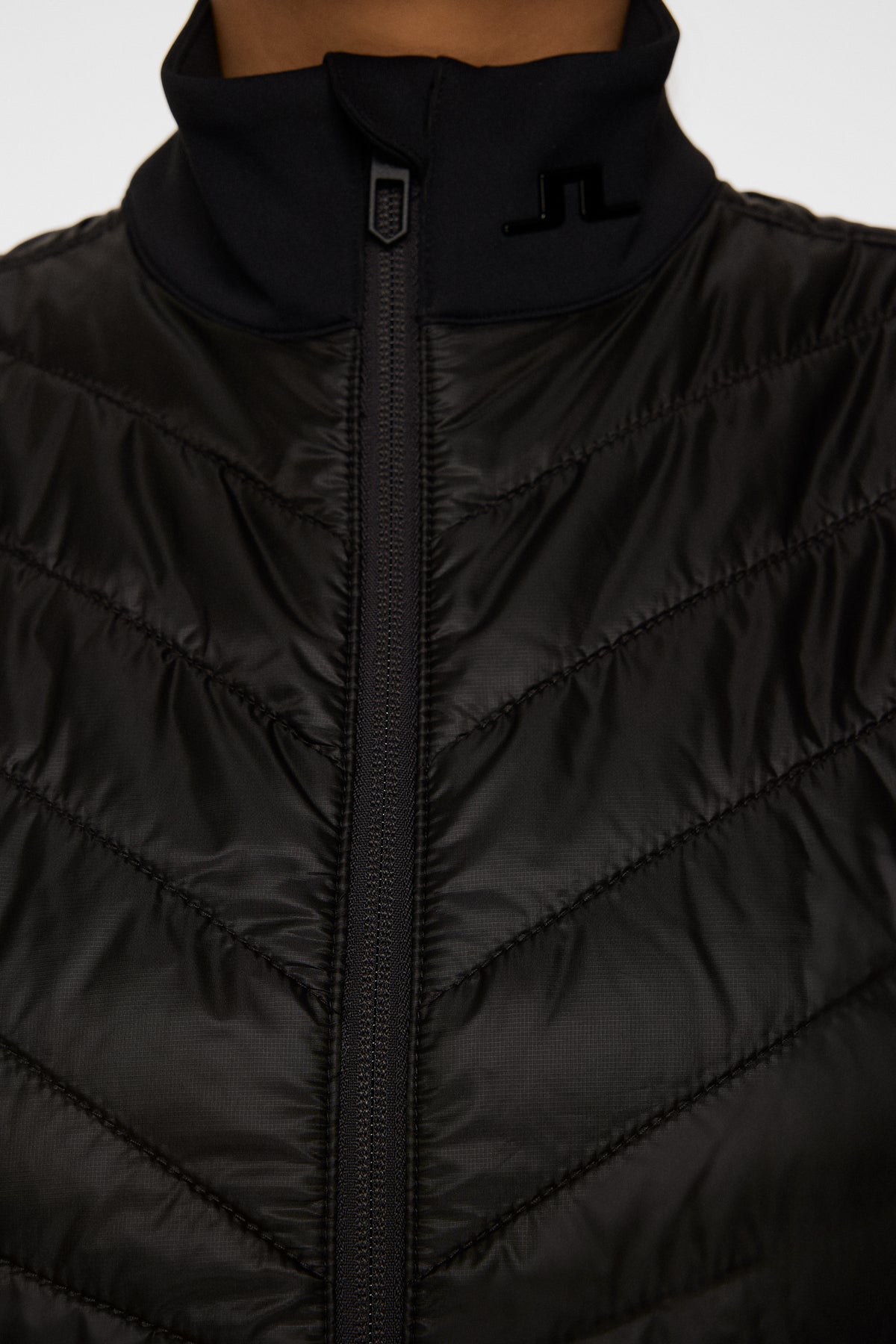 Madde Quilt Hybrid Vest in Black by J.Lindeberg