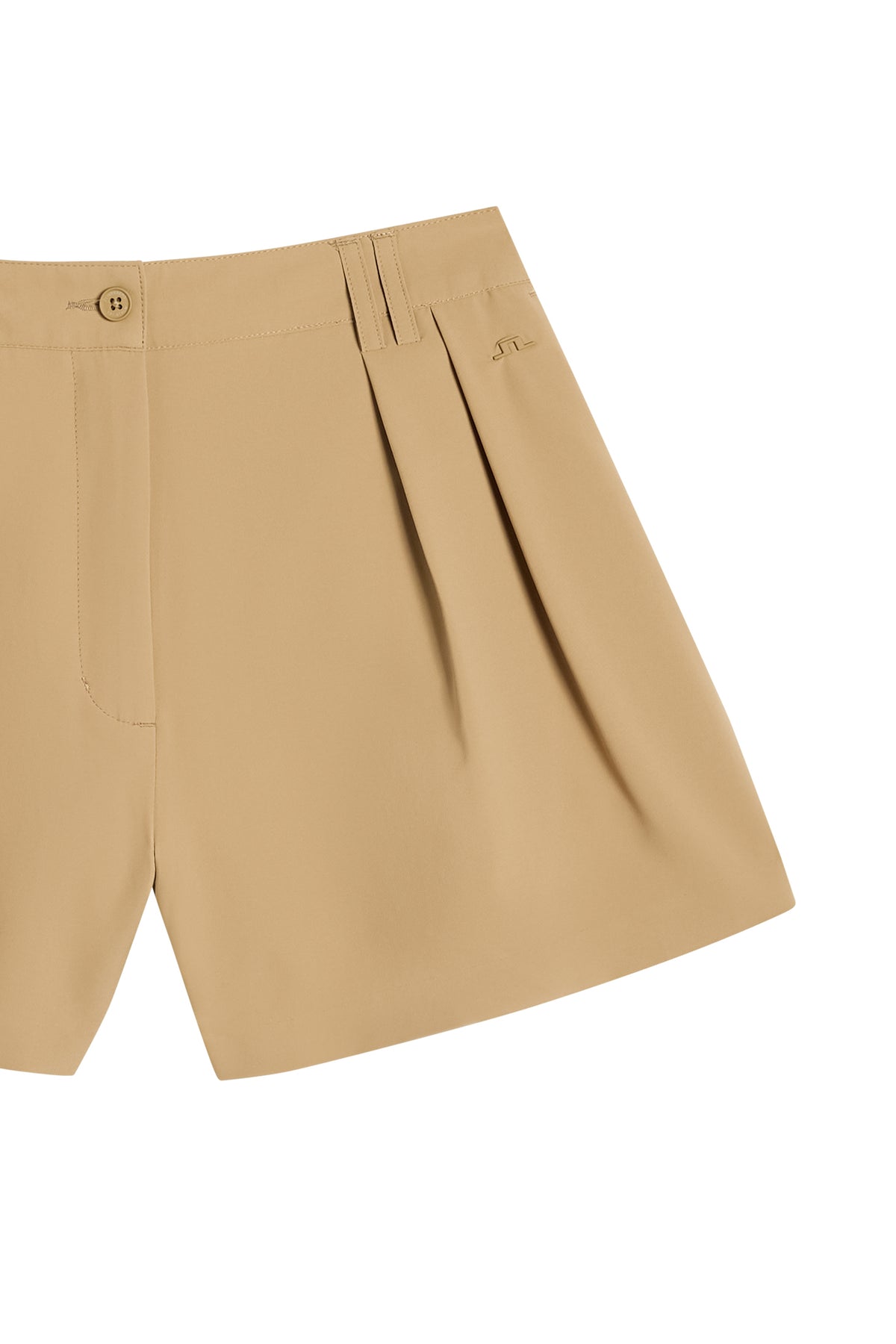 Close-up of front pleats, button waistband, and Bridge rivet on the Carmen Shorts in Kelp.