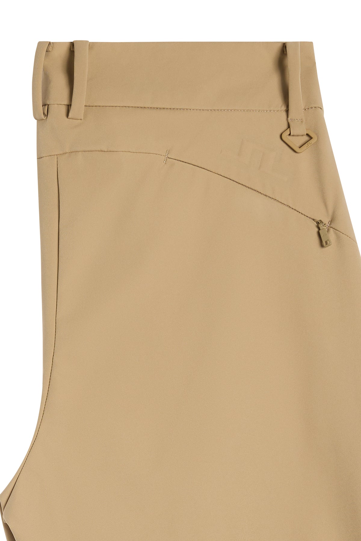 Close-up of waistband with belt loops and embossed Bridge logo on the Pinja Nylon Pant in Kelp.