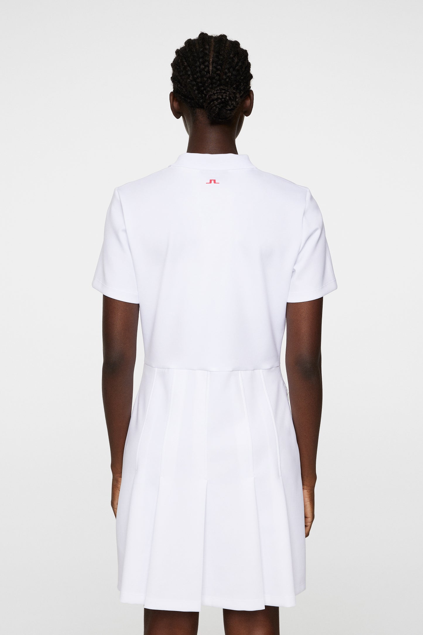 Kanai dress in White by J.Lindeberg