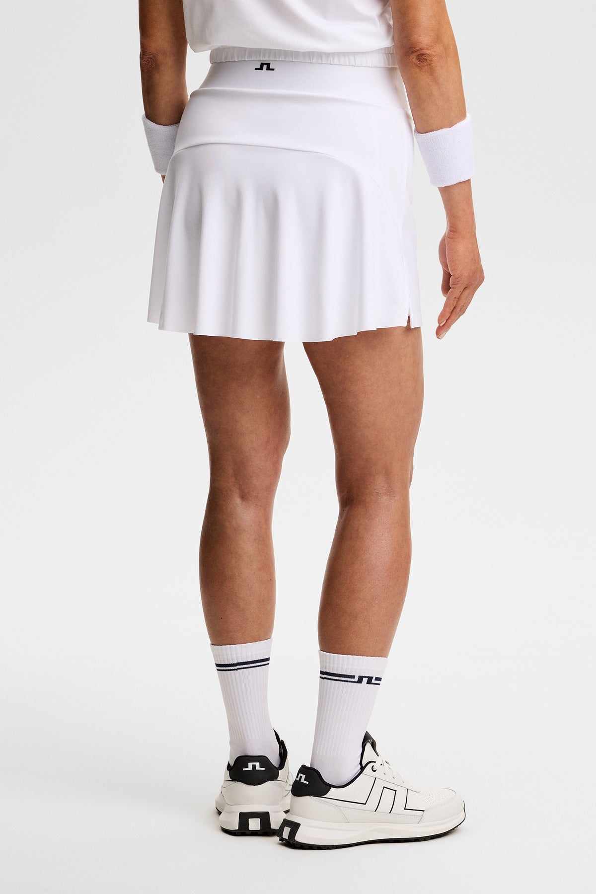 Shania Skirt in White by J.Lindeberg